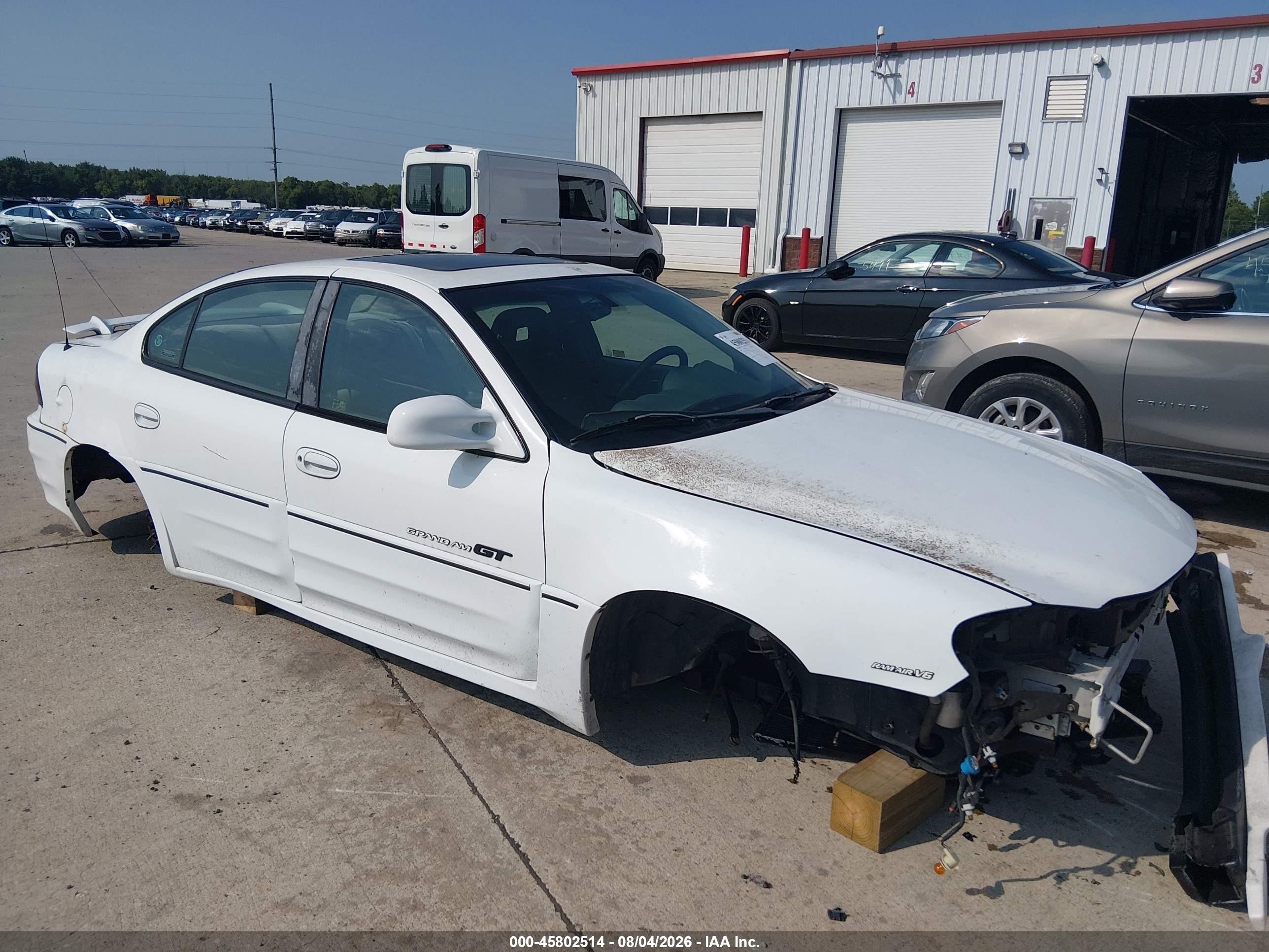 2002 Pontiac Grand Am GT, VIN 1G2NW52E32M594125 — Normal wear