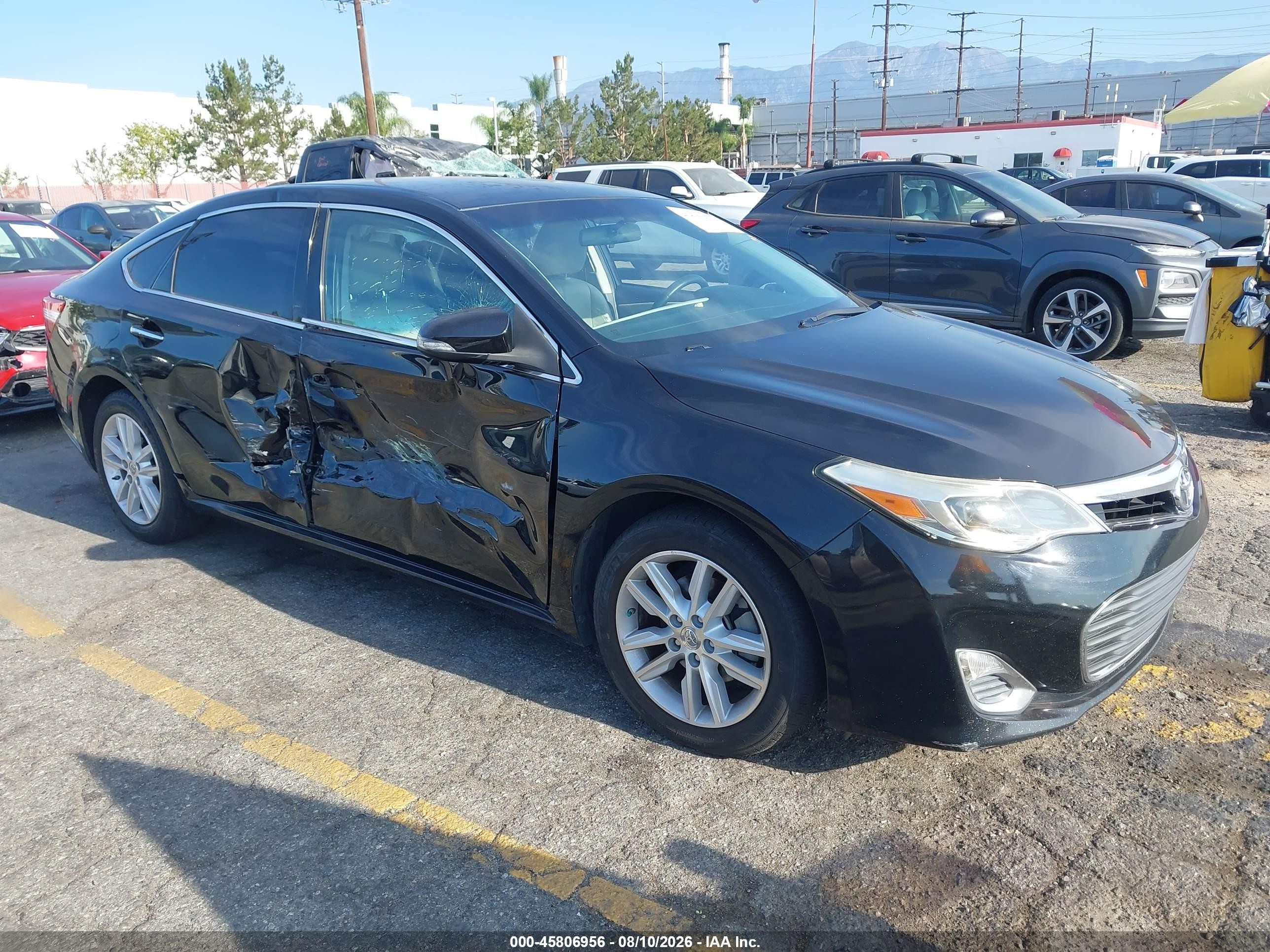 2014 Toyota Avalon XLE Touring, VIN 4T1BK1EB9EU080526 — Side