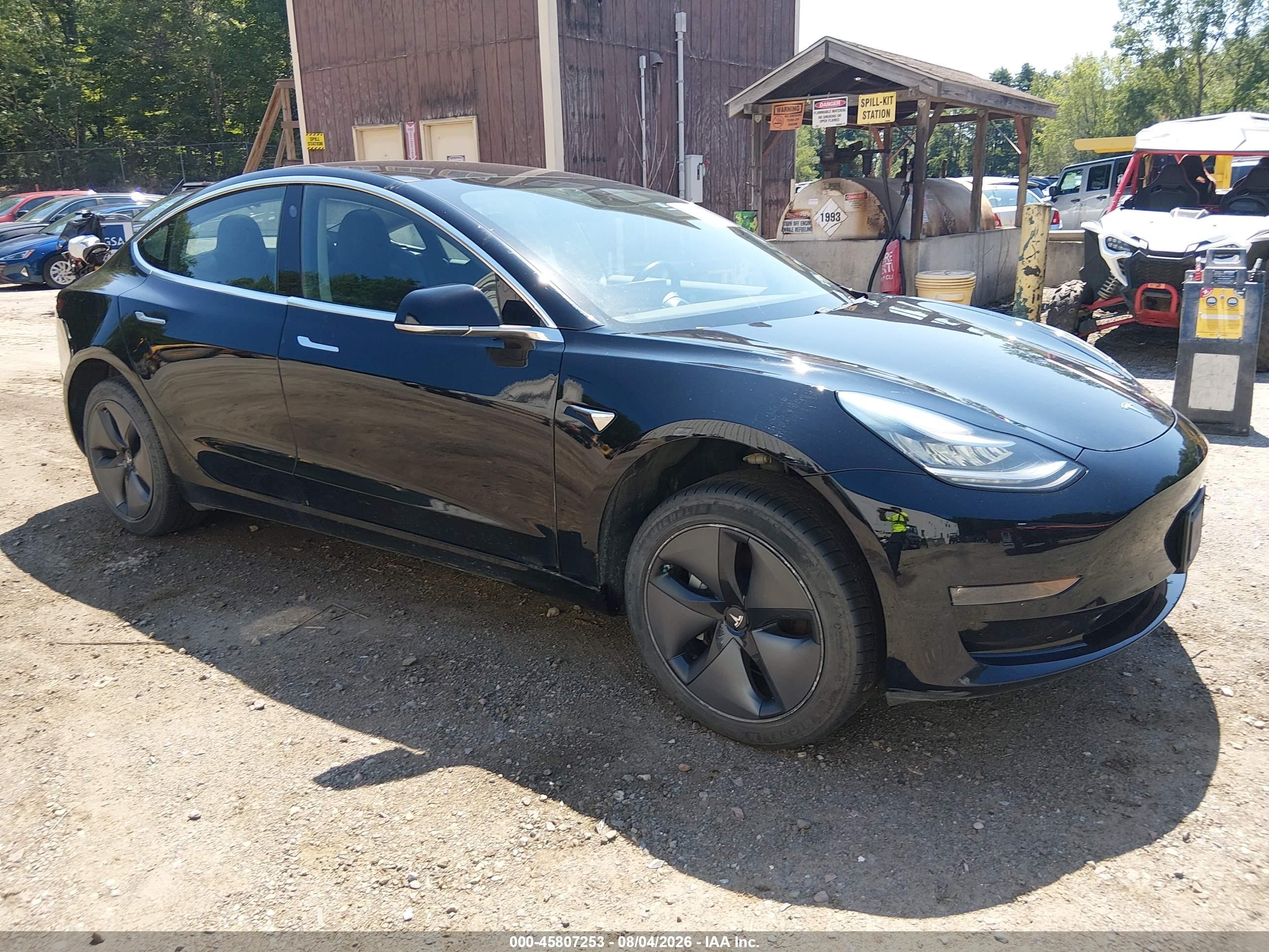 2019 Tesla Model 3 Long Range, VIN 5YJ3E1EB9KF384394 — Normal wear