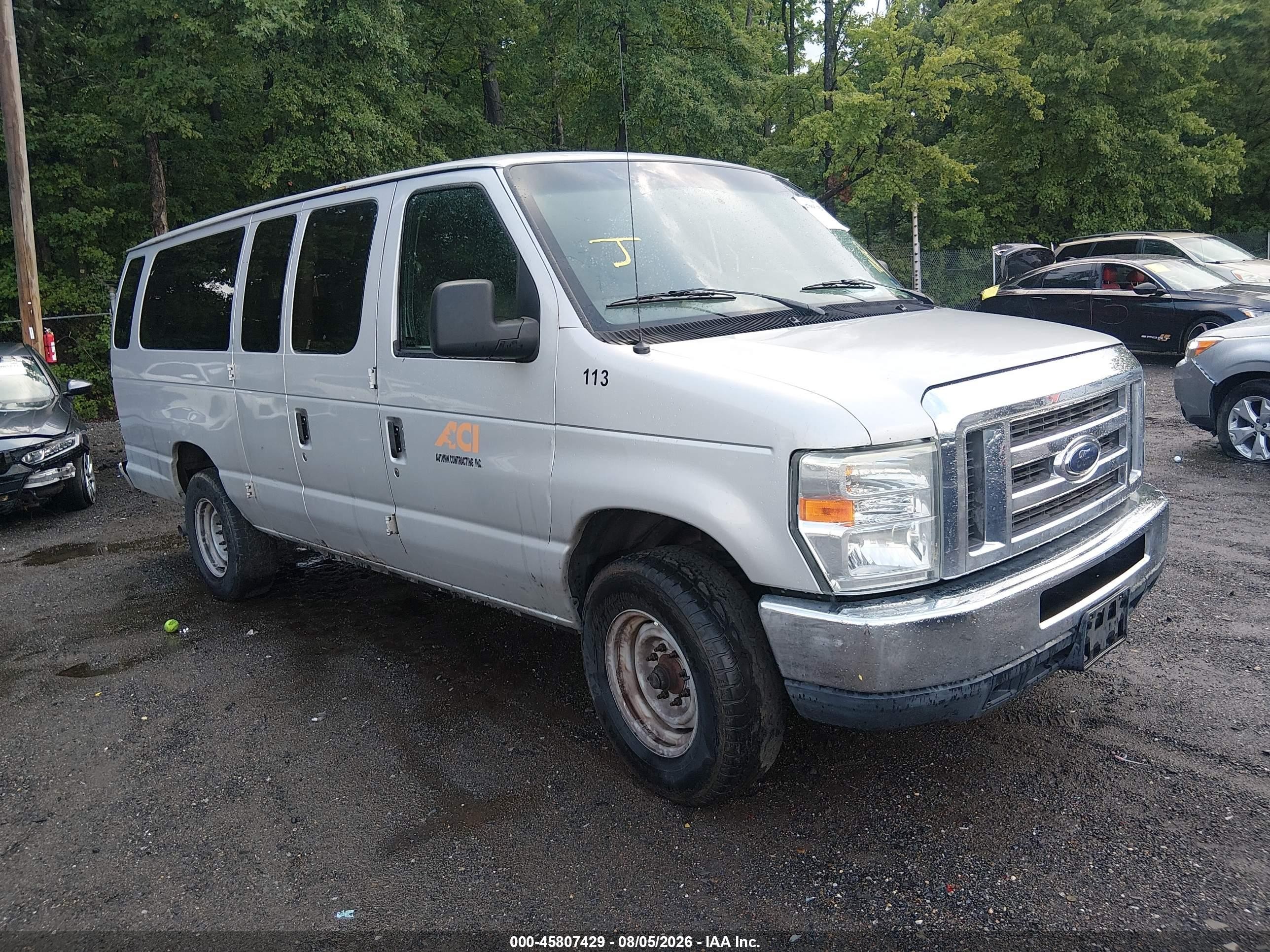 2011 Ford Econoline Passenger XLT, VIN 1FBSS3BL9BDB38034 — Normal wear