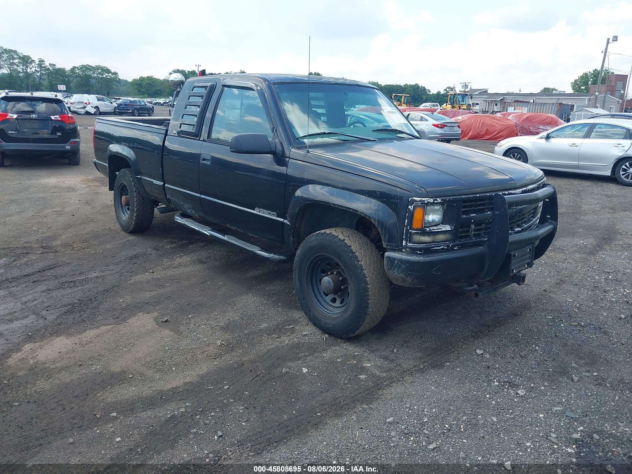 1997 Chevrolet Silverado 2500, VIN 1GCGK29RXVE261491 — Бок