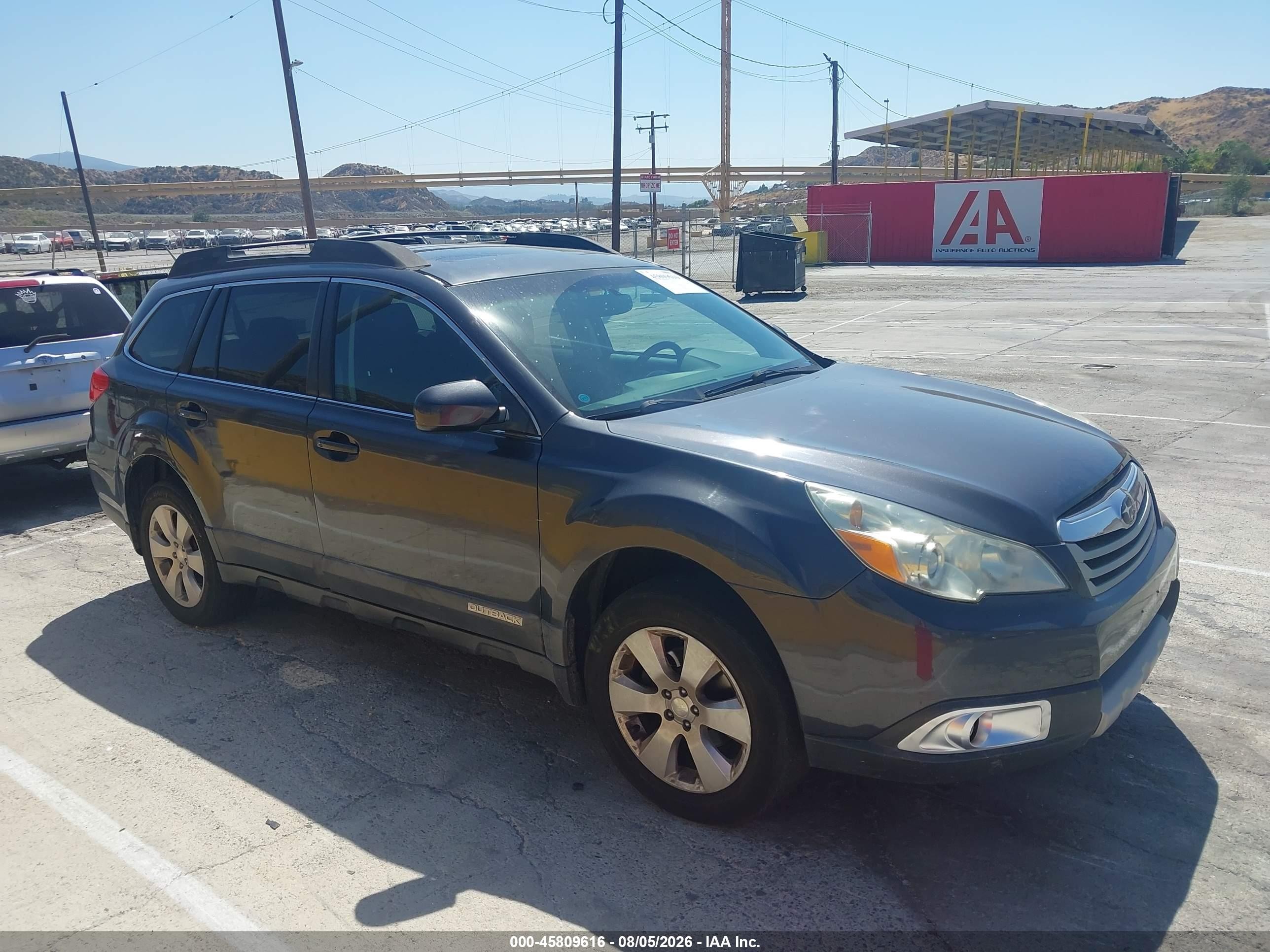 2012 Subaru Outback Prem, VIN 4S4BRBGC8C3245444 — Side