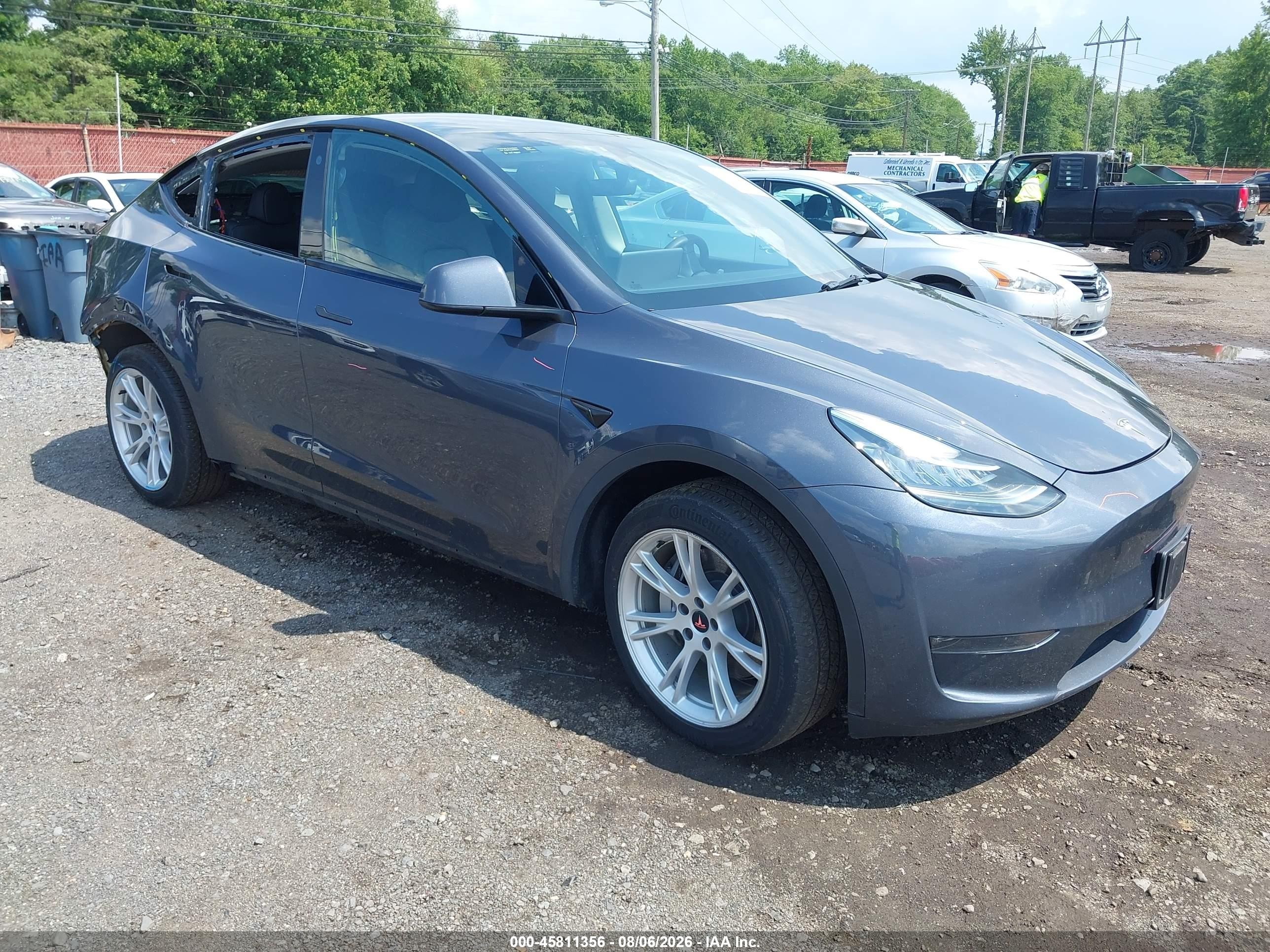 2023 Tesla Model Y Long Range, VIN 7SAYGDEE0PA045171 — Rear end