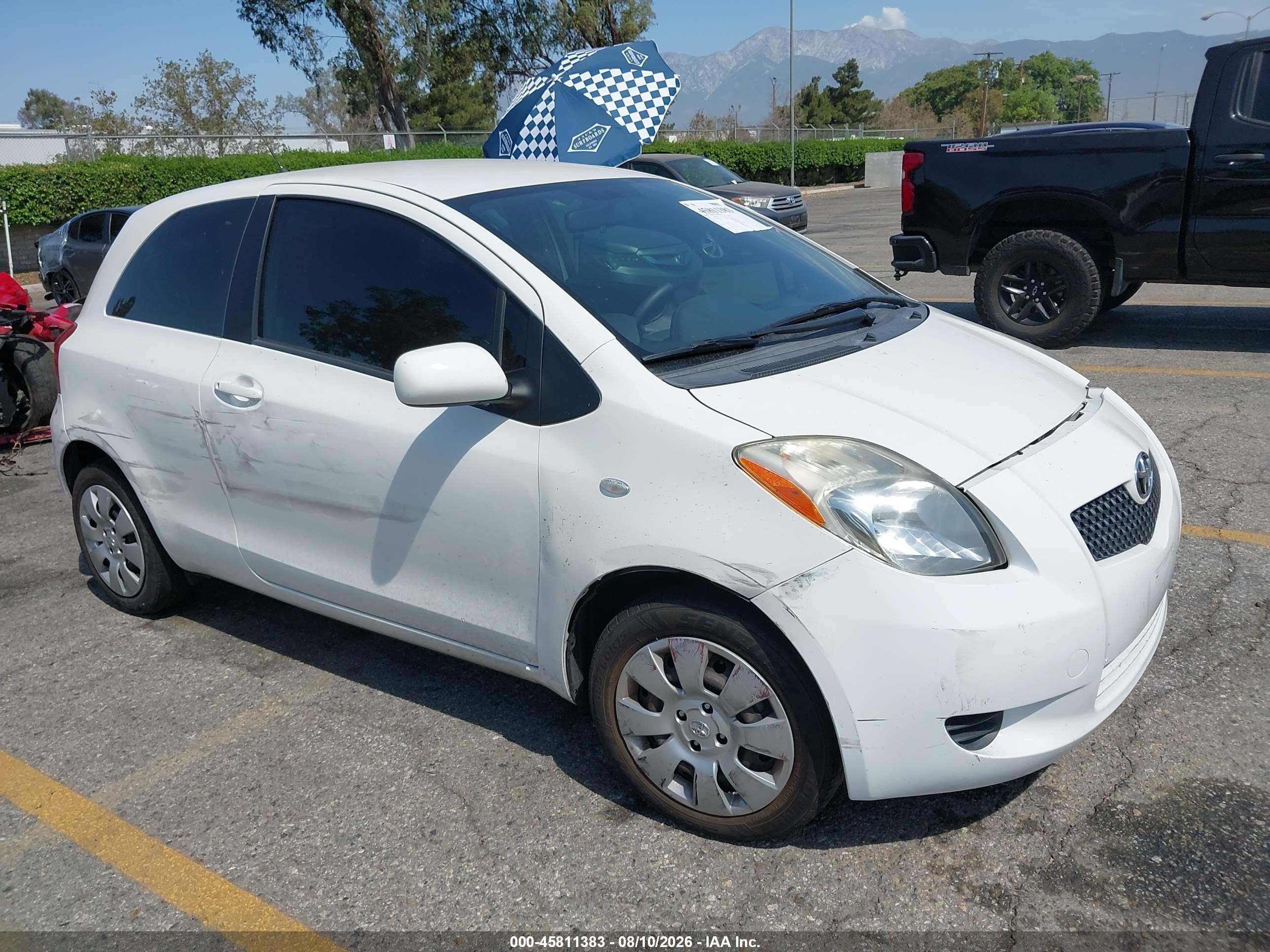 2008 Toyota Yaris, VIN JTDJT923485151803 — Side