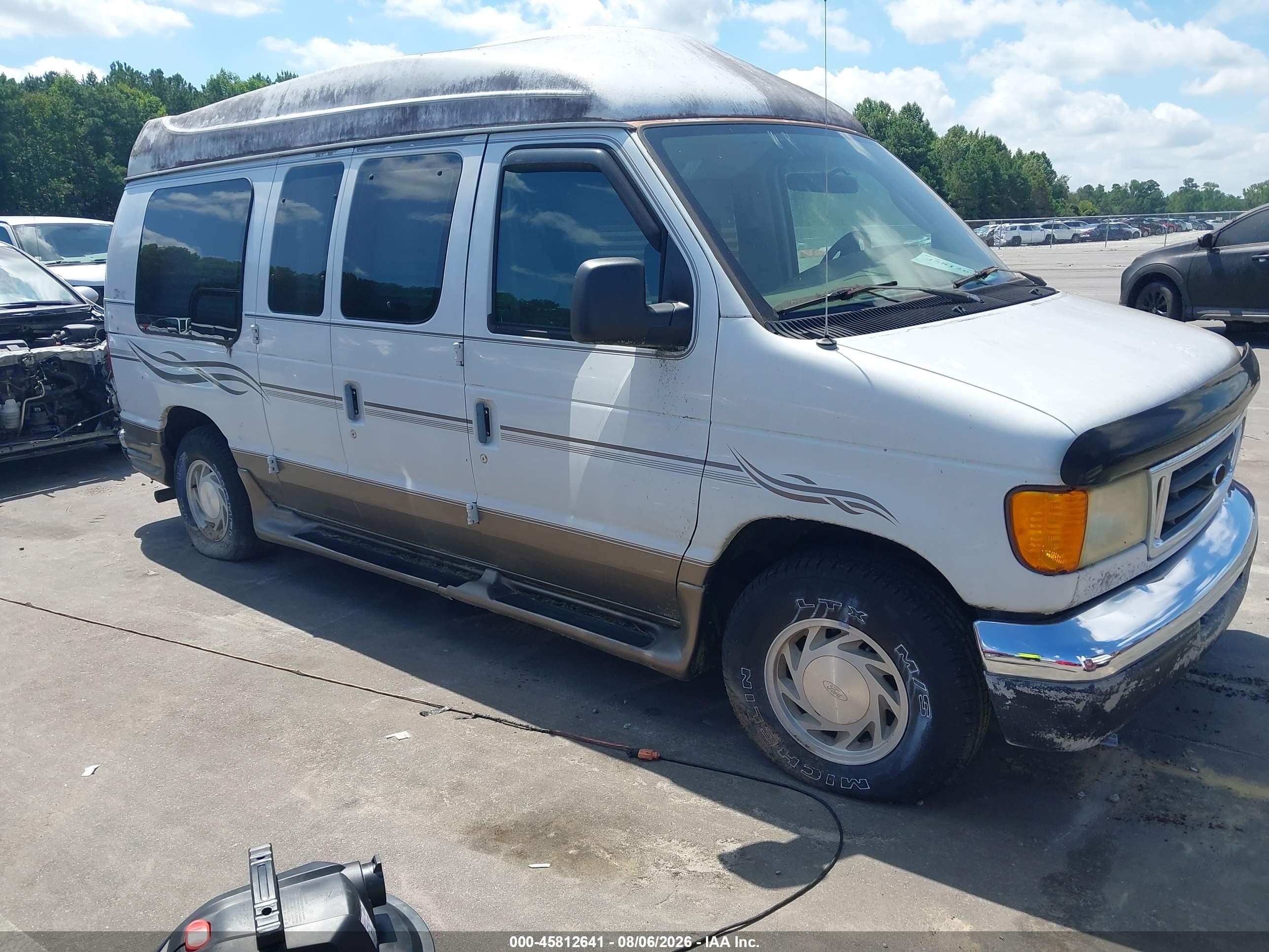 2003 Ford Econoline Cargo Recreational, VIN 1FDRE14L63HB94697 — Обычный износ