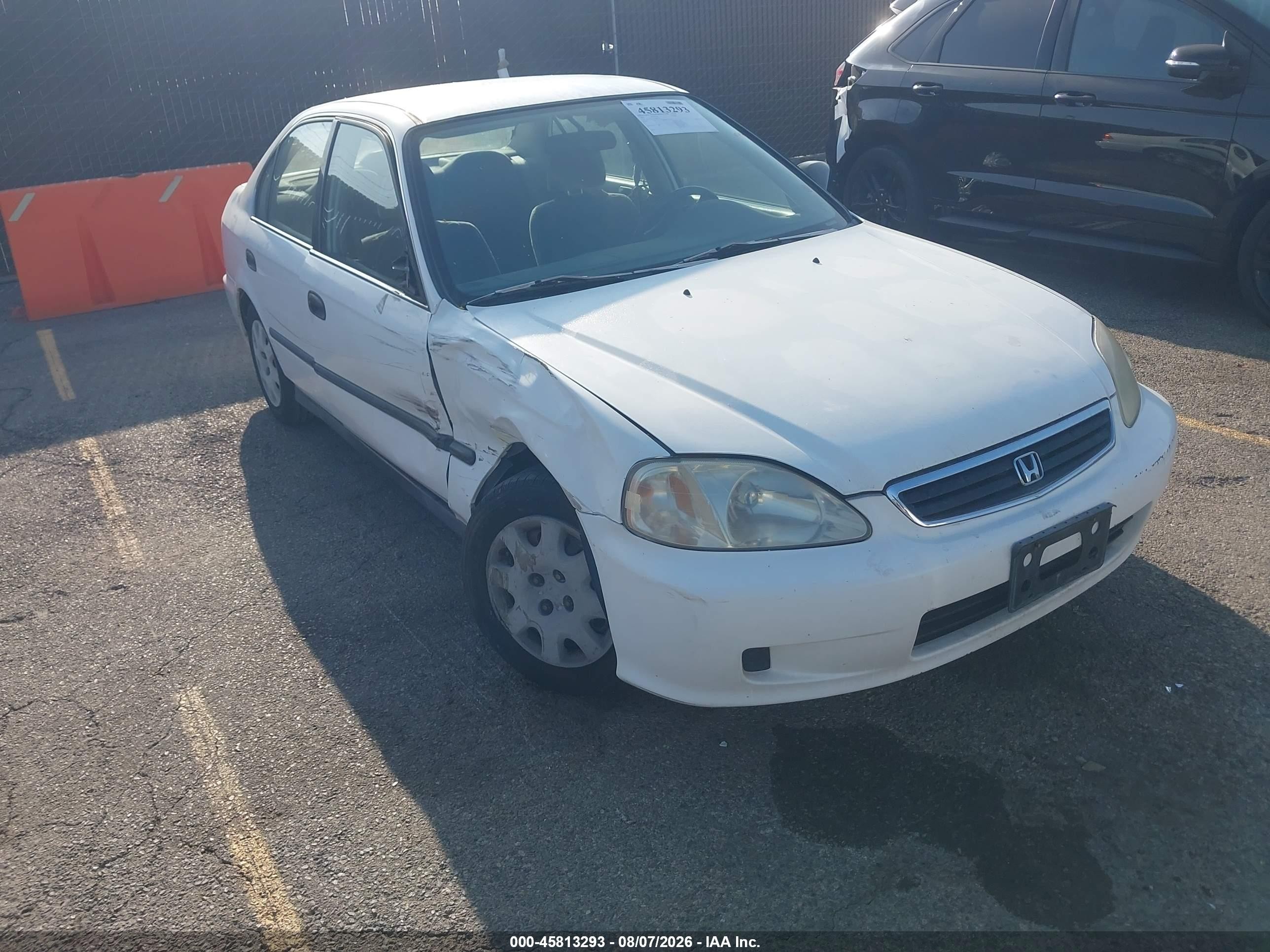 1999 Honda Civic LX, VIN JHMEJ6679XS003177 — Side