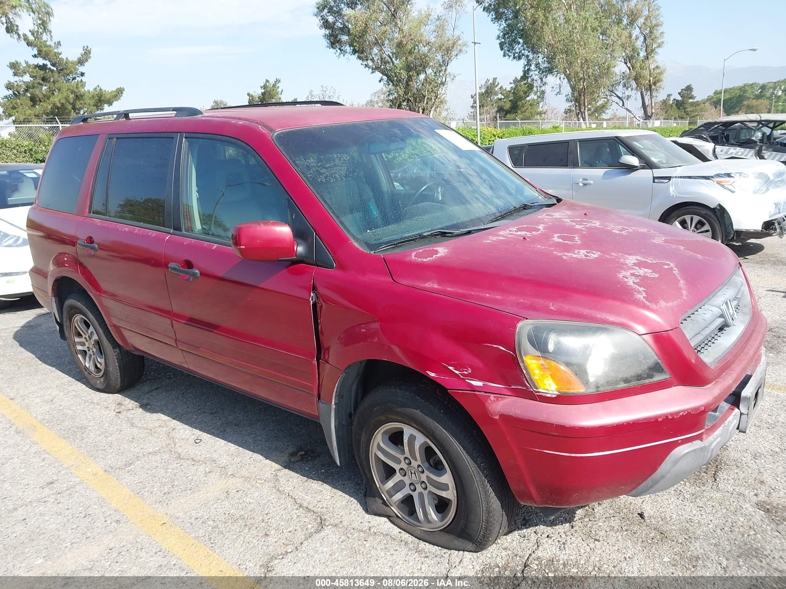 2003 Honda Pilot EX, VIN 2HKYF18603H606910 — Бок