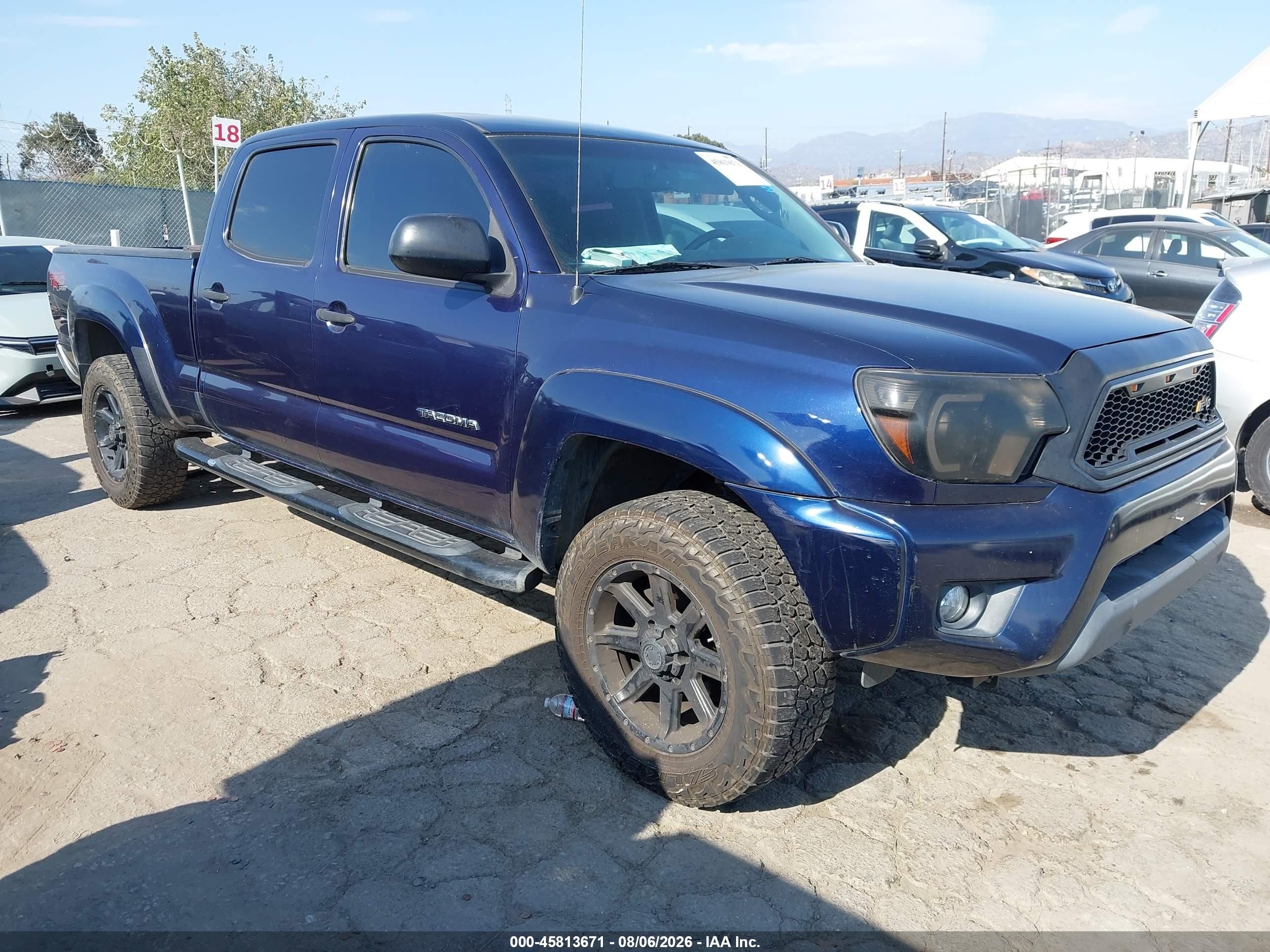 2012 Toyota Tacoma PreRunner, VIN 3TMKU4HN8CM032166 — Rear end