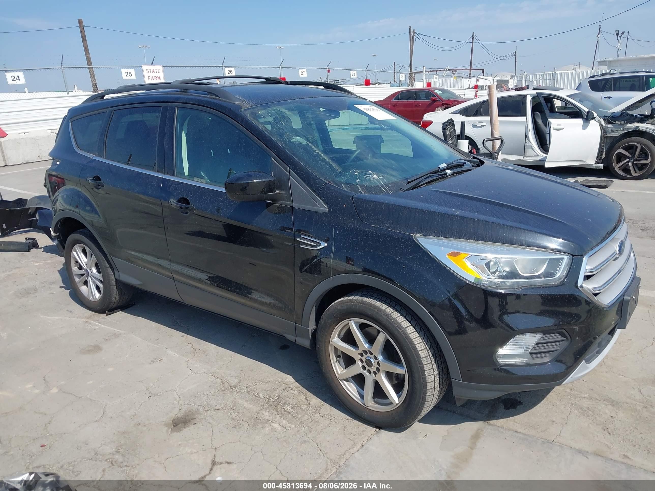 2018 Ford Escape SEL, VIN 1FMCU0HD2JUA86295 — Rear end