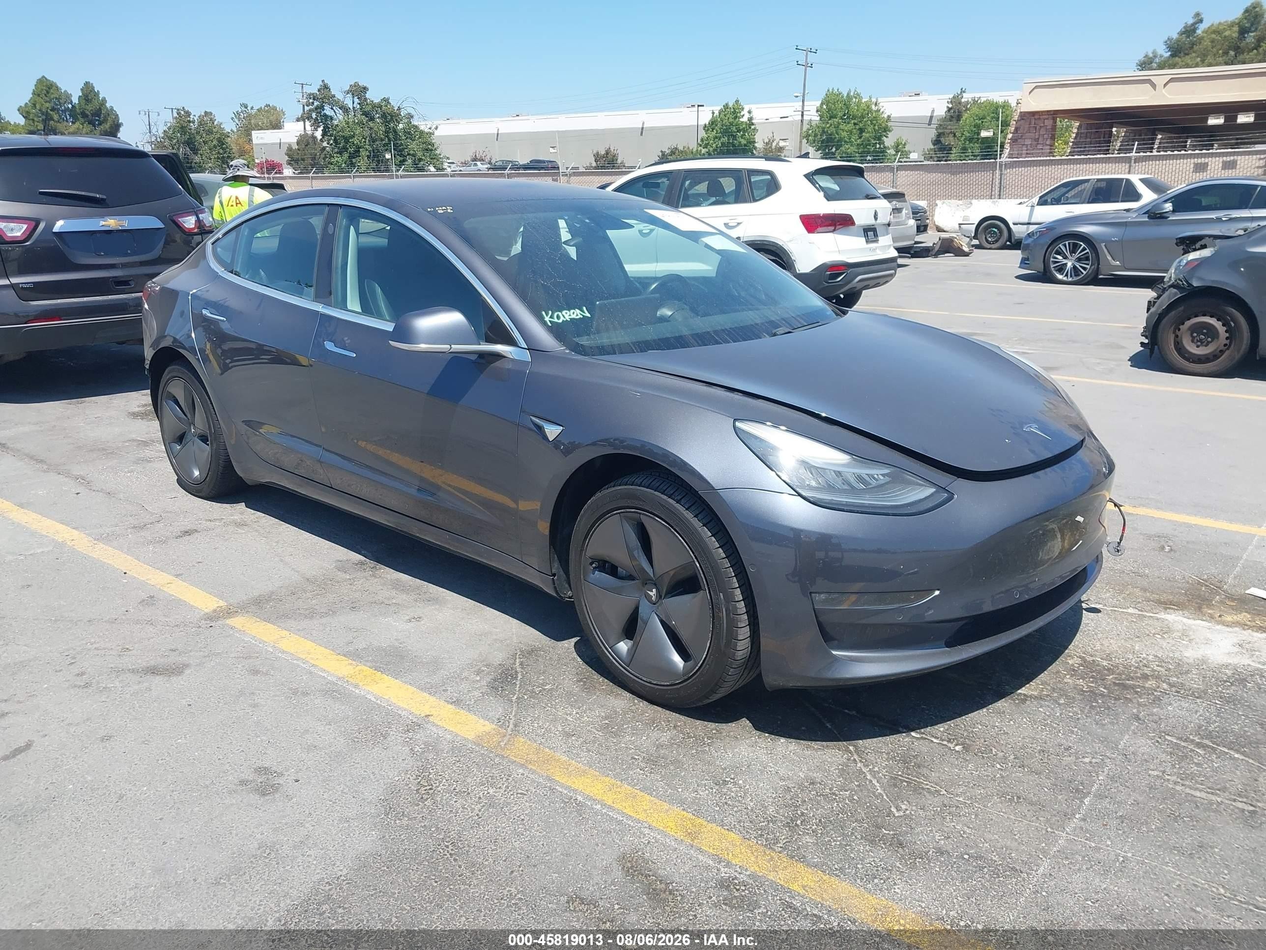 2018 Tesla Model 3 Long Range Battery, VIN 5YJ3E1EA1JF006950 — Rear end