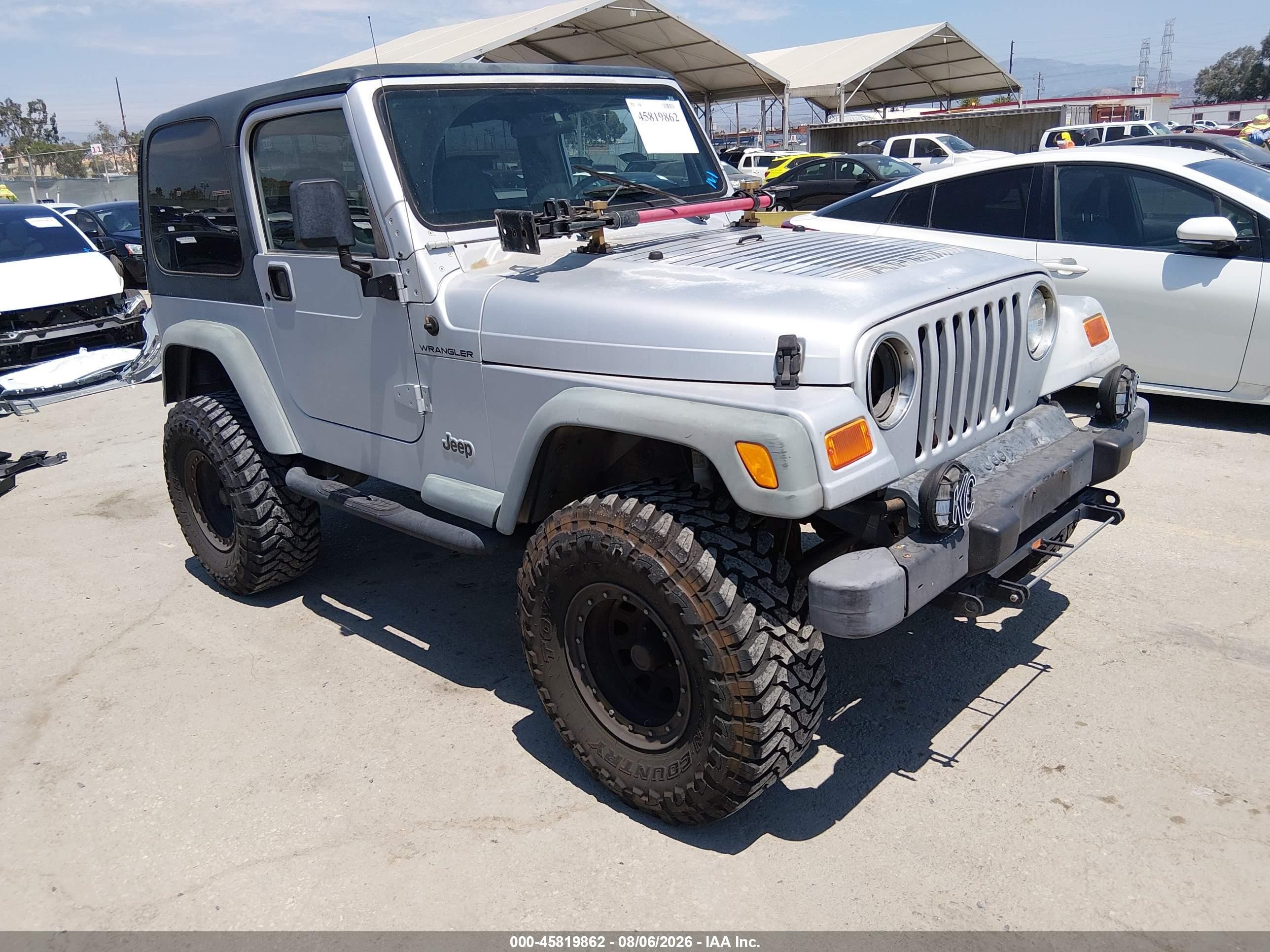 2002 Jeep Wrangler X, VIN 1J4FA39SX2P750958 — Rear end