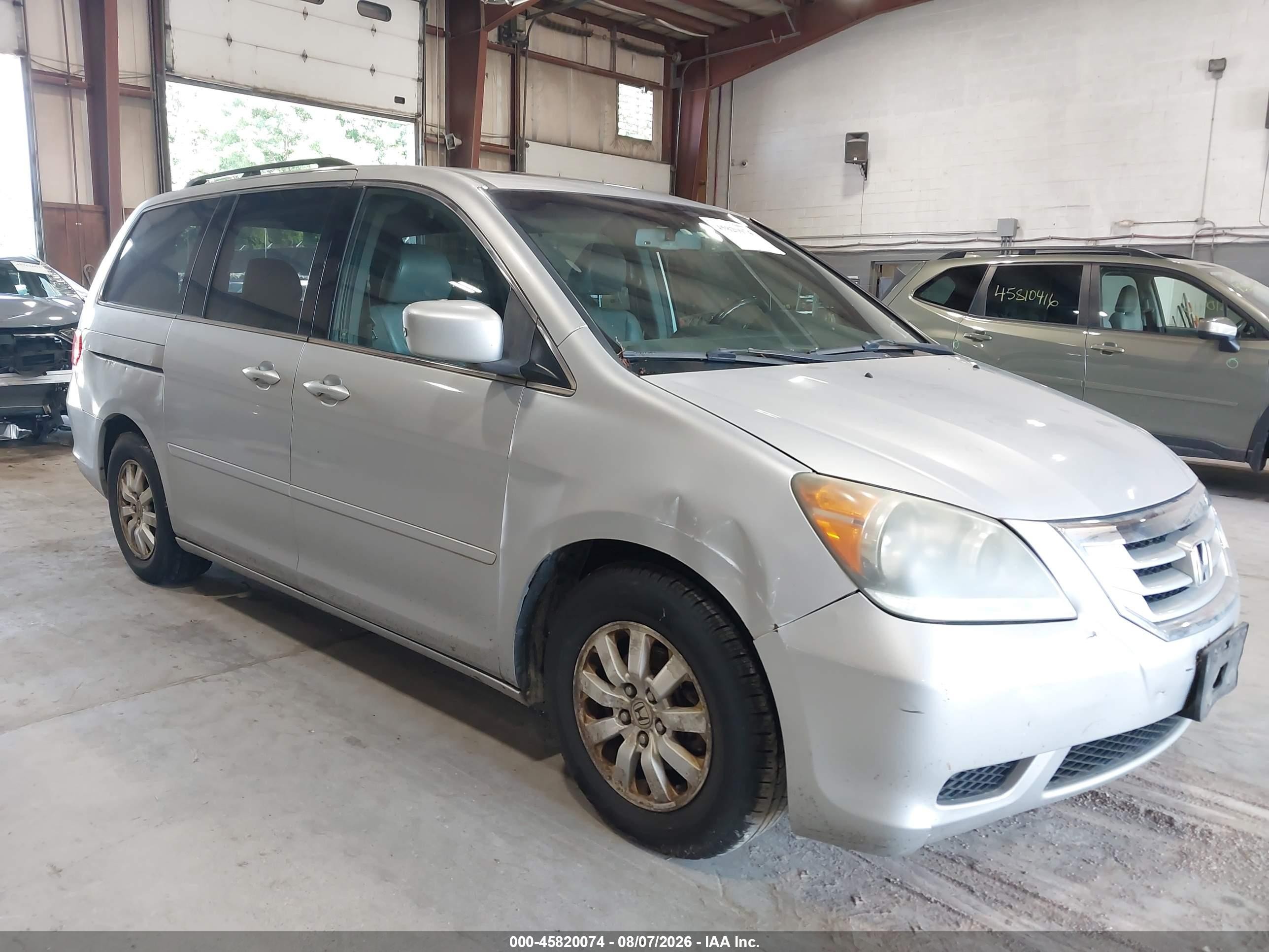 2010 Honda Odyssey EX-L, VIN 5FNRL3H62AB067355 — Side