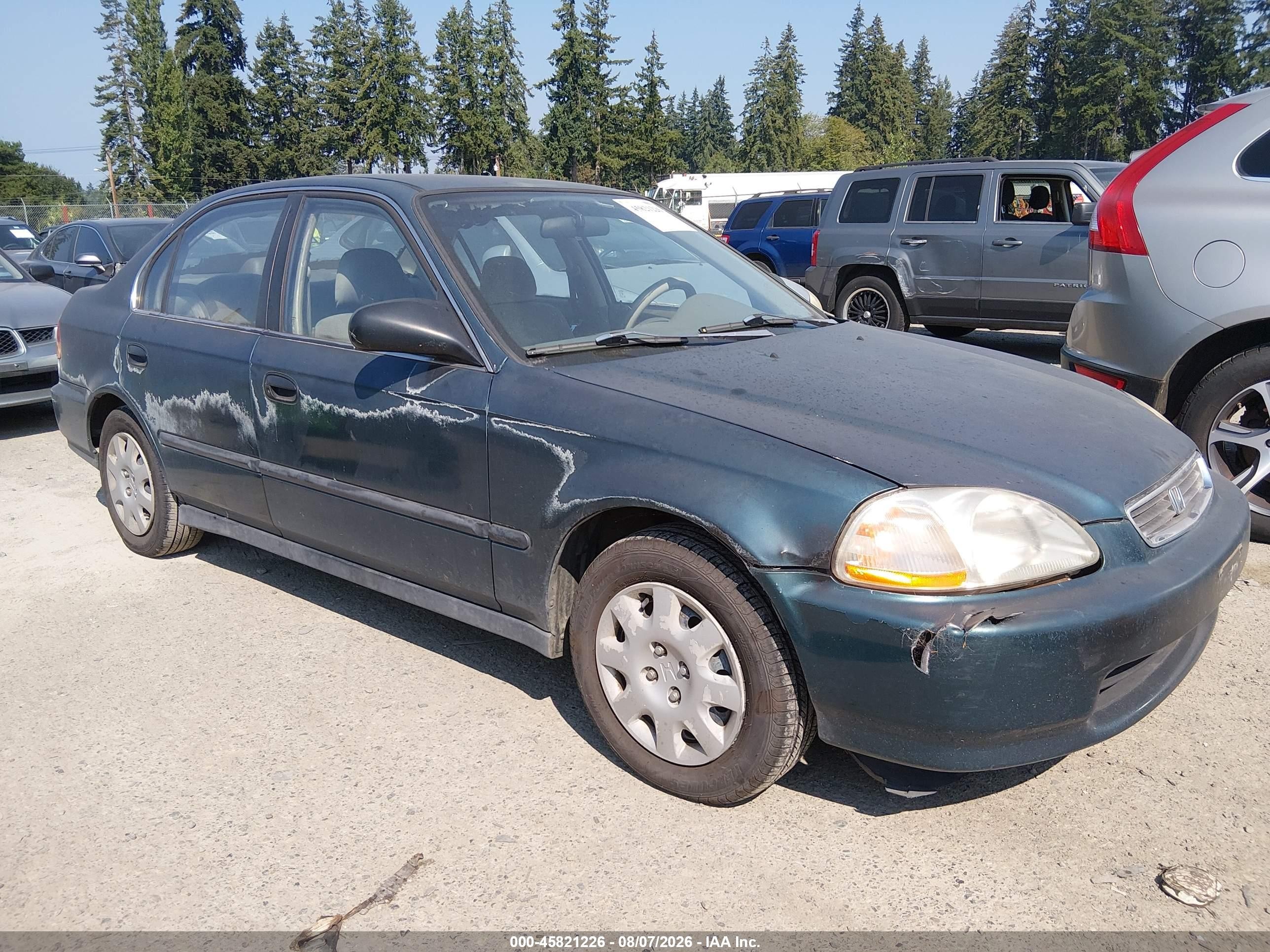 1998 Honda Civic LX, VIN 2HGEJ6670WH571827 — Normal wear