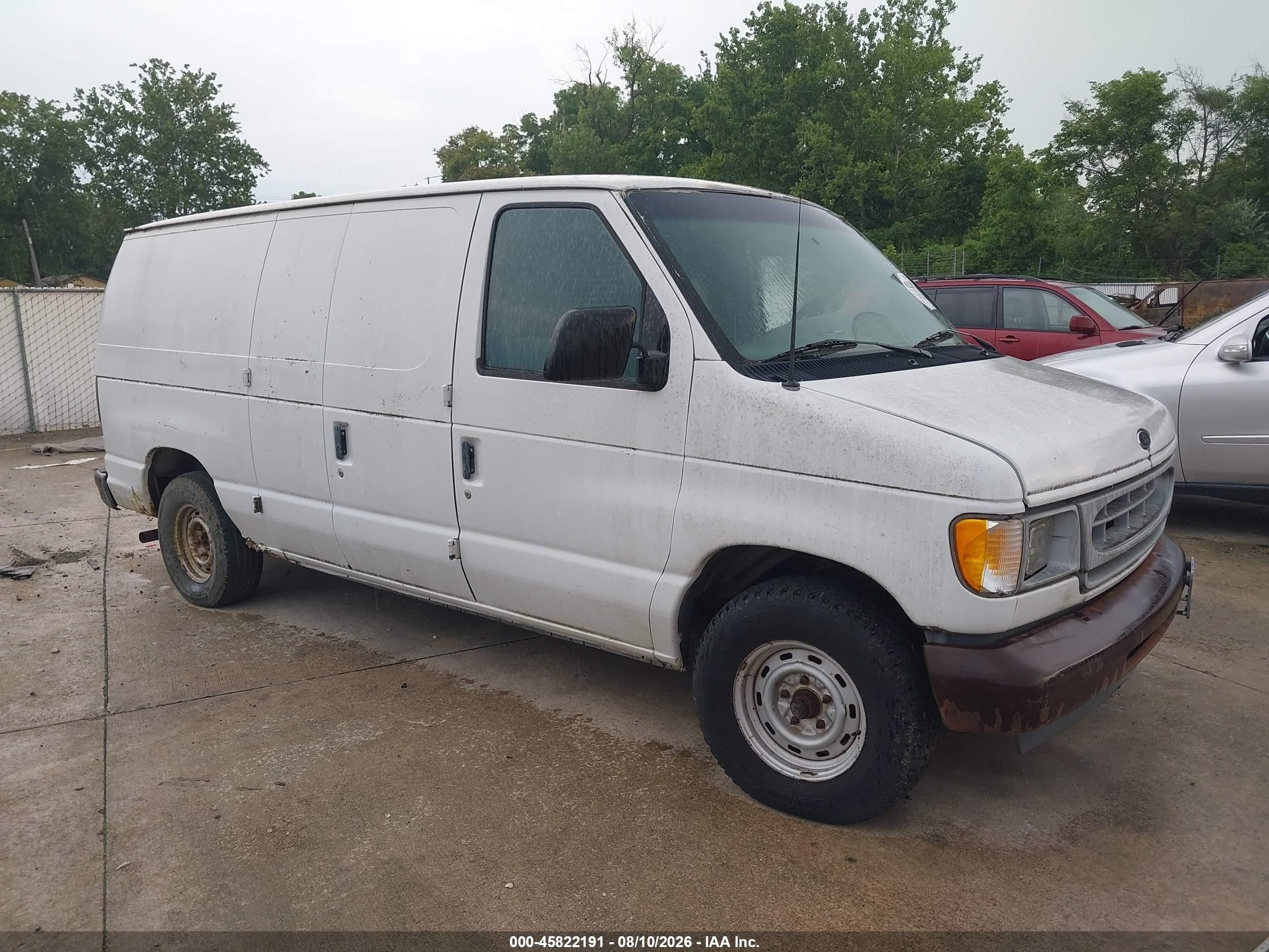2002 Ford Econoline Cargo, VIN 1FTRE142X2HB24744 — Normal wear