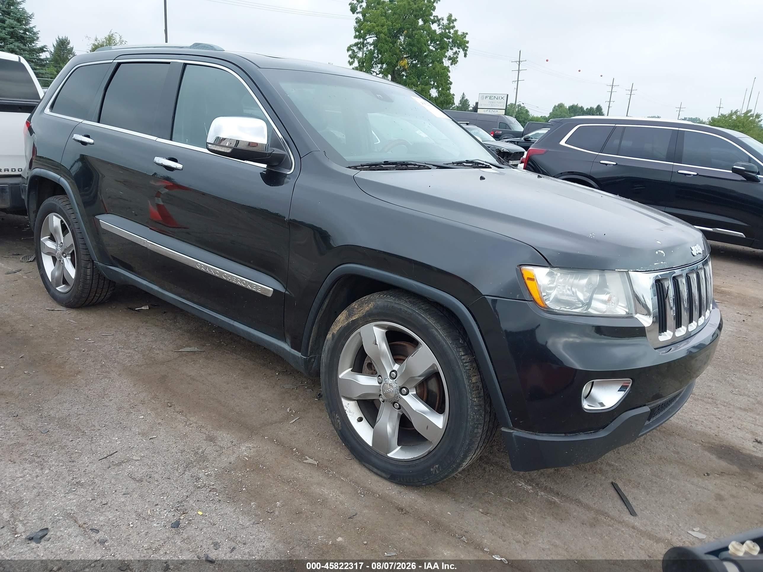 2011 Jeep Grand Cherokee Overland Summit, VIN 1J4RR6GTXBC606661 — Normal wear