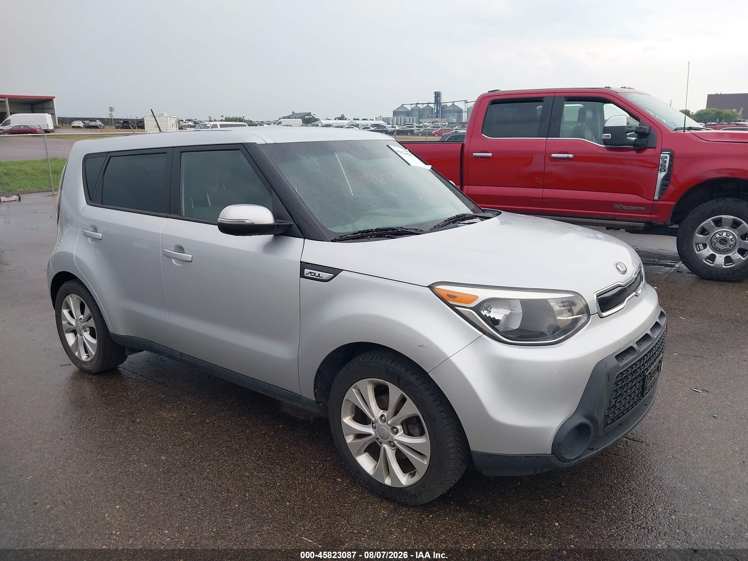 2014 Kia Soul +, VIN KNDJP3A54E7736787 — Side