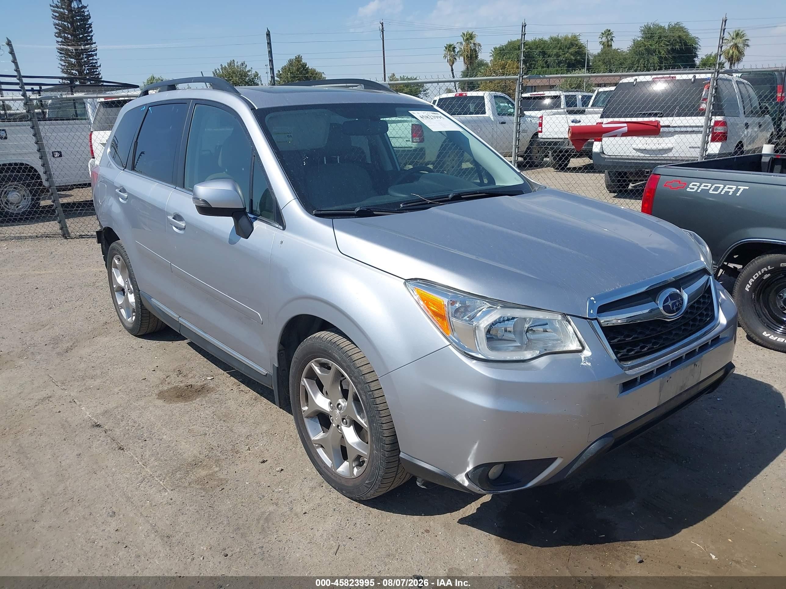 2015 Subaru Forester Touring, VIN JF2SJAUC8FH812285 — Rear end
