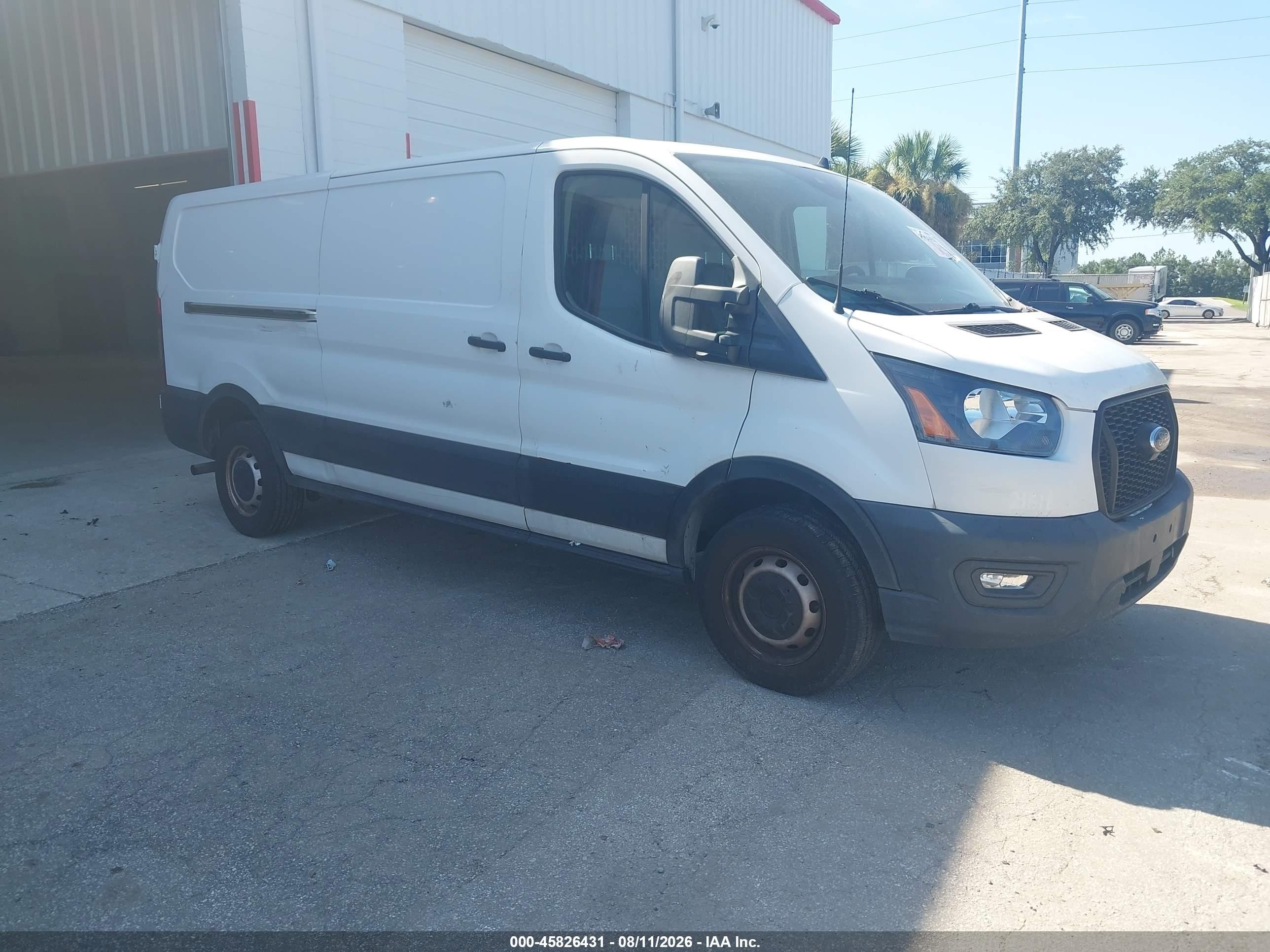 2021 Ford Transit Cargo, VIN 1FTBR1Y84MKA53390 — Side