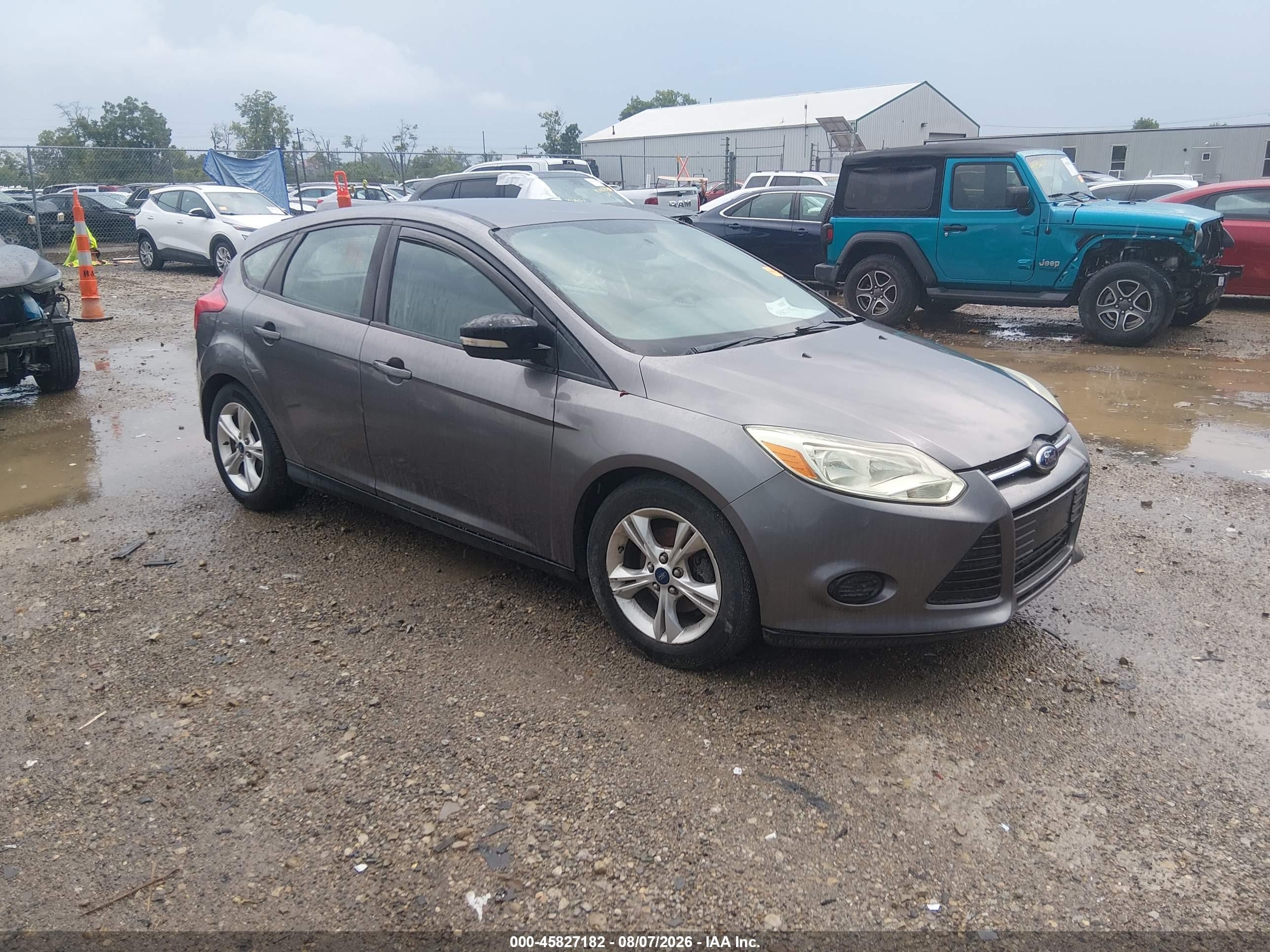 2014 Ford Focus SE, VIN 1FADP3K28EL392959 — Normal wear