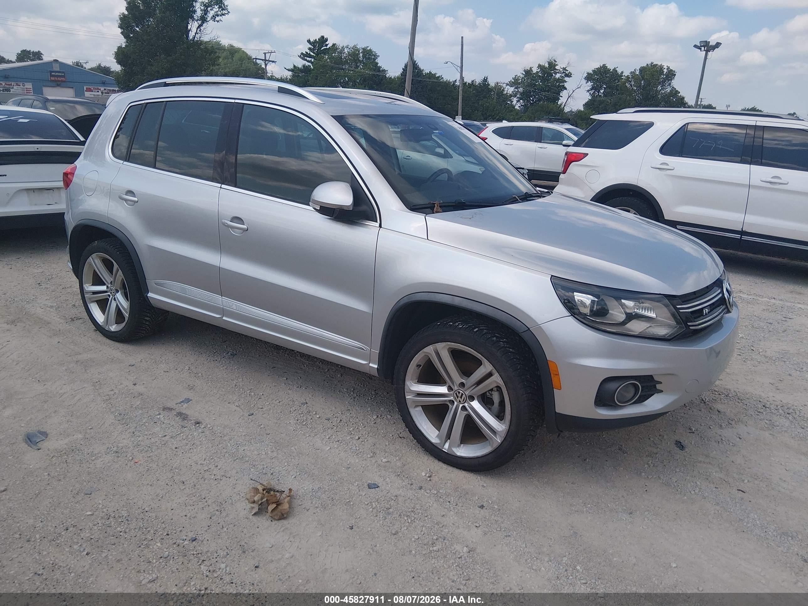 2015 Volkswagen Tiguan SEL, VIN WVGBV7AX4FW084677 — Обычный износ