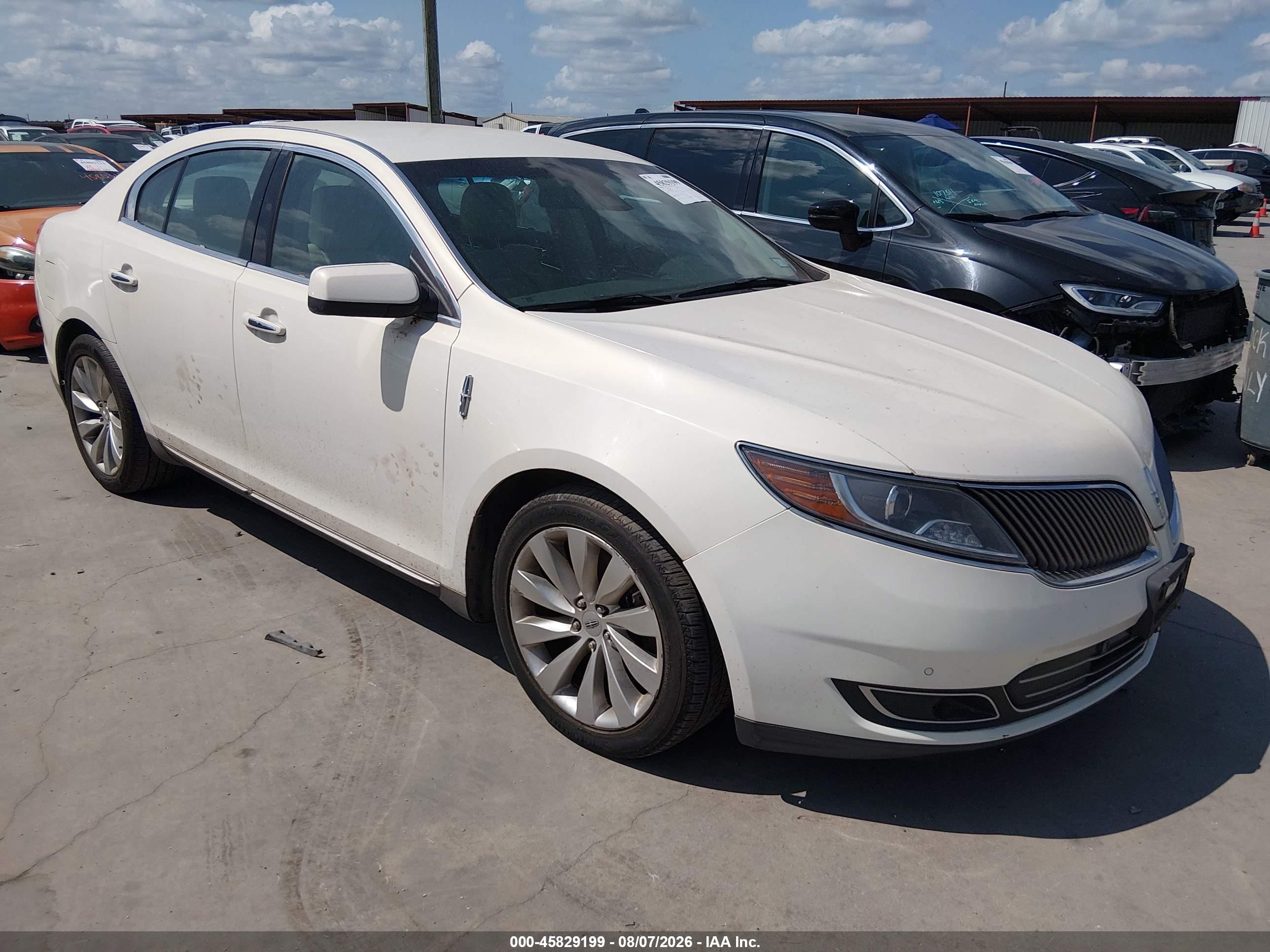 2013 Lincoln MKS, VIN 1LNHL9DK9DG618260 — Normal wear