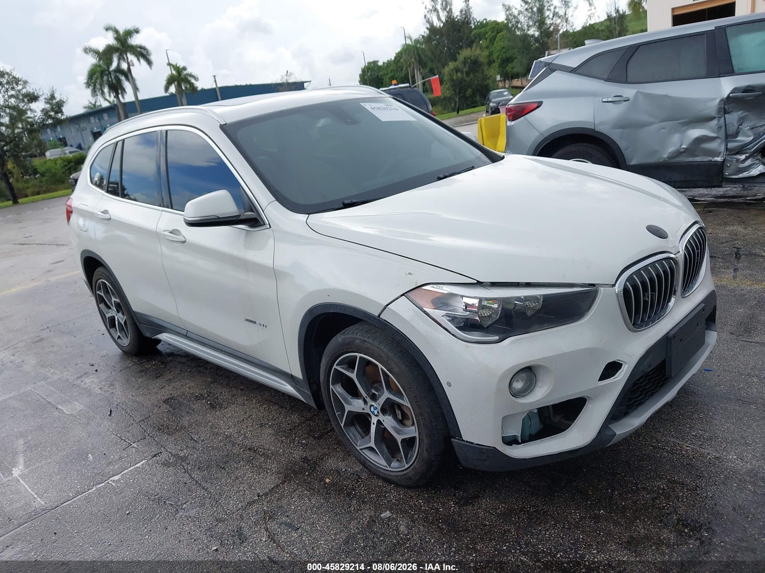 2018 BMW X1 xDrive28i, VIN WBXHT3C31J5K25147 — Front end