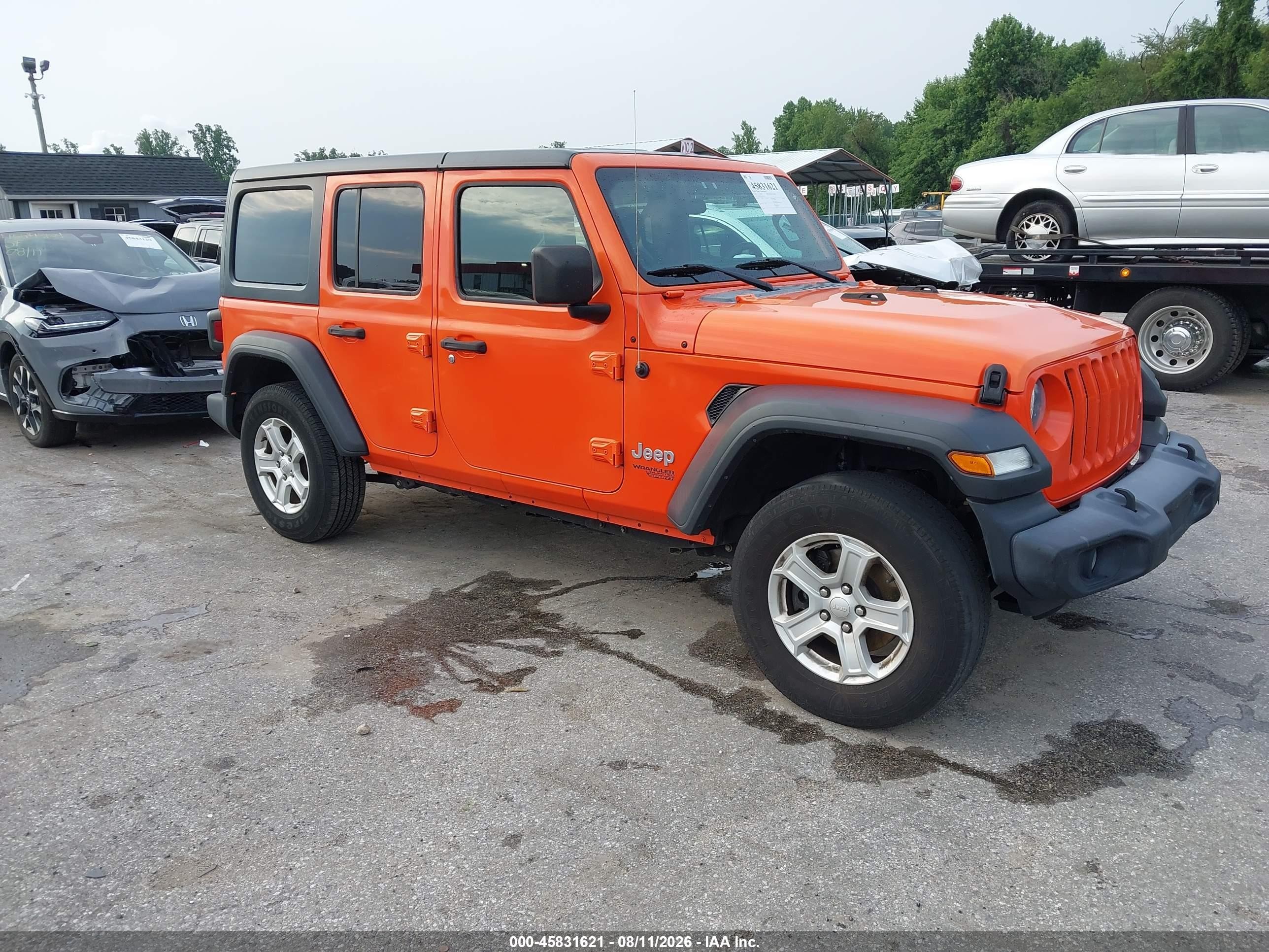 2019 Jeep Wrangler Unlimited Sport S, VIN 1C4HJXDG1KW659205 — Зад