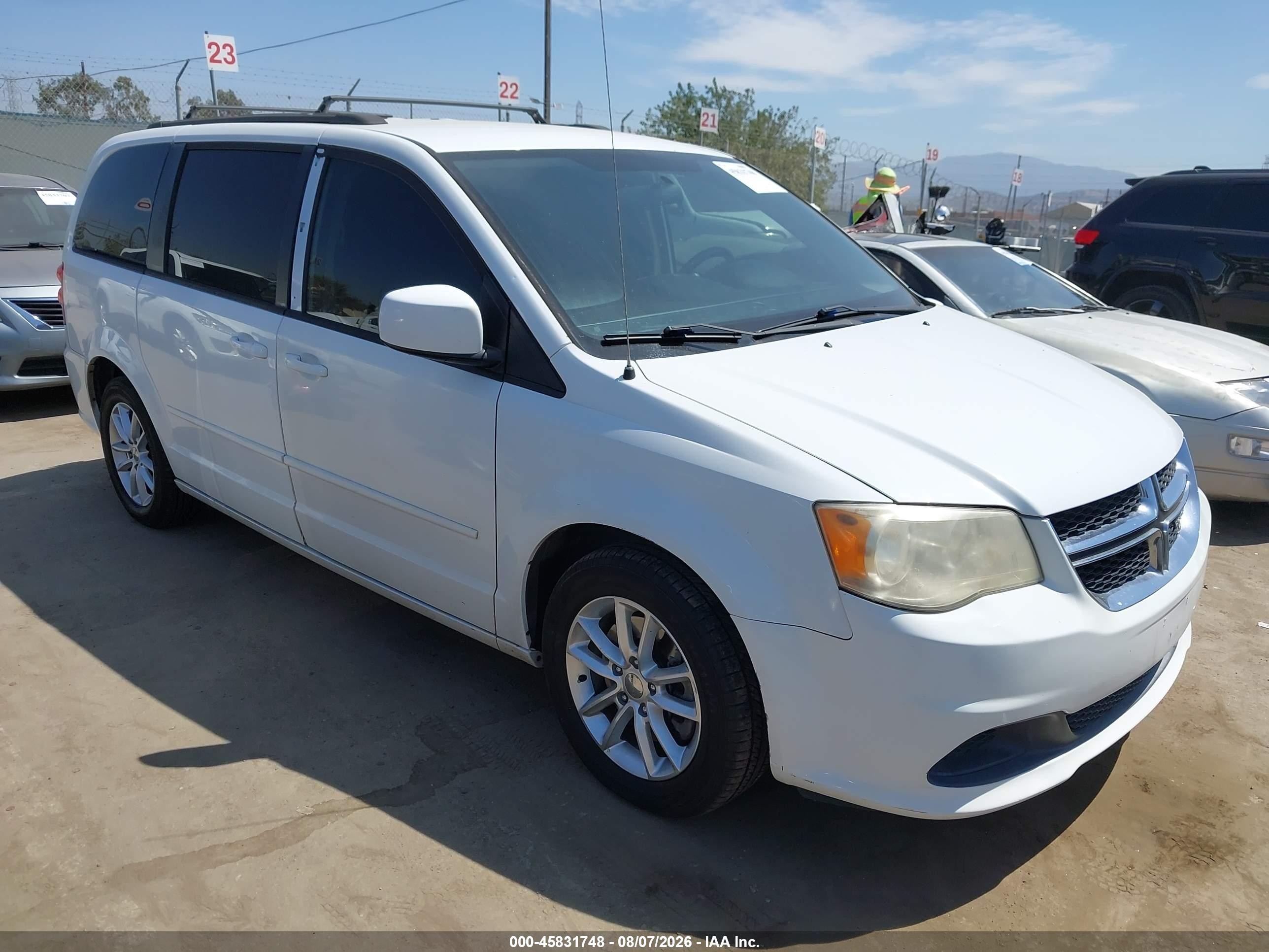 2014 Dodge Grand Caravan SXT, VIN 2C4RDGCG9ER321609 — Repossession