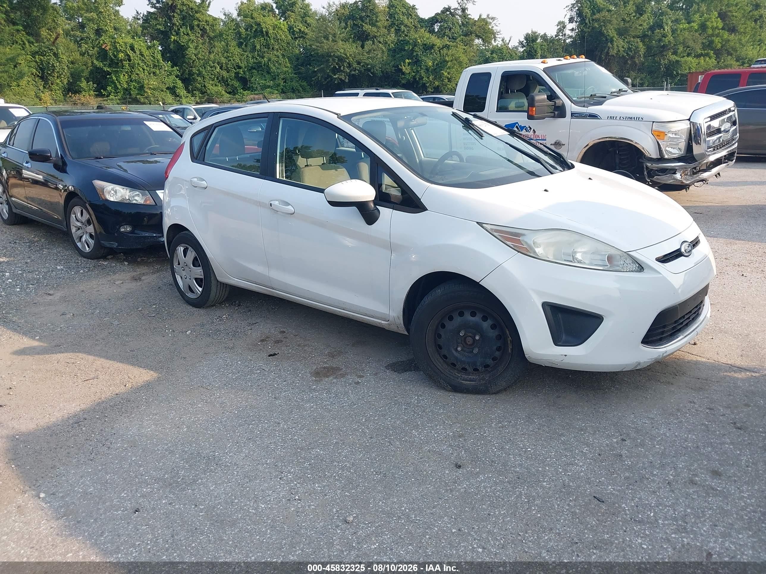 2013 Ford Fiesta S, VIN 3FADP4TJ1DM215419 — Normal wear