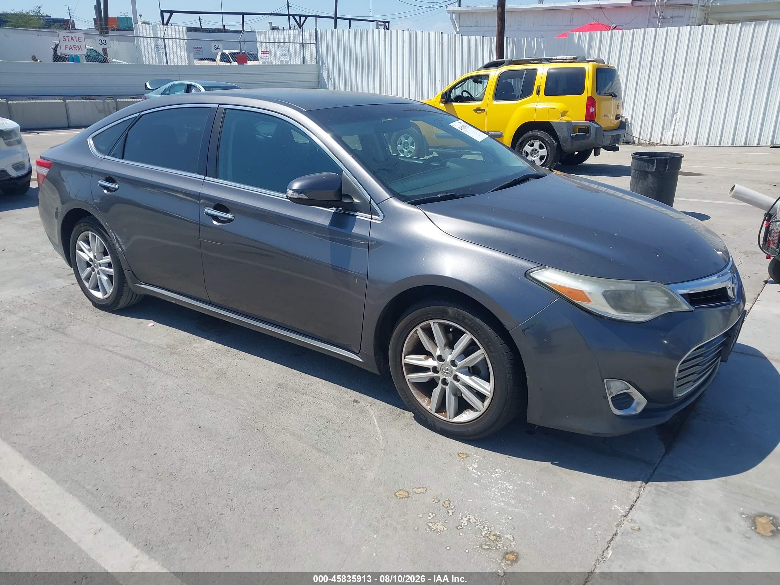 2014 Toyota Avalon XLE Touring, VIN 4T1BK1EB5EU108242 — Side