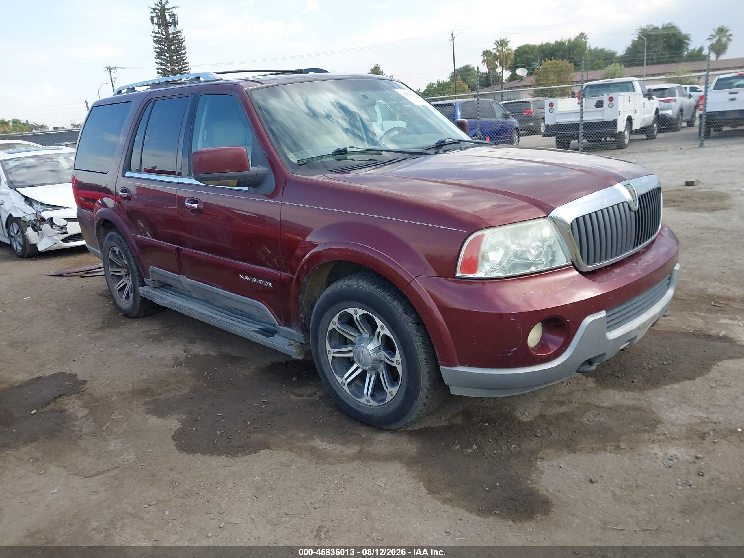 2003 Lincoln Navigator Ultimate, VIN 5LMFU27RX3LJ23931 — Бок