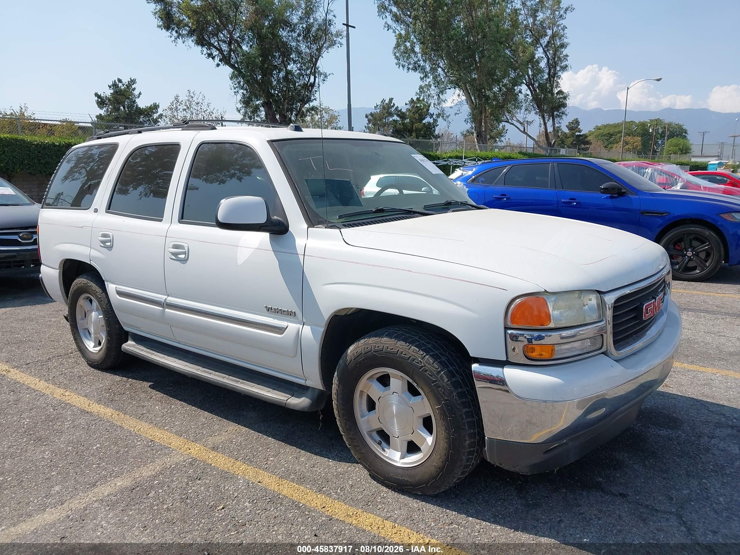 2005 GMC Yukon SLE, VIN 1GKEC13T05J154447 — Зад