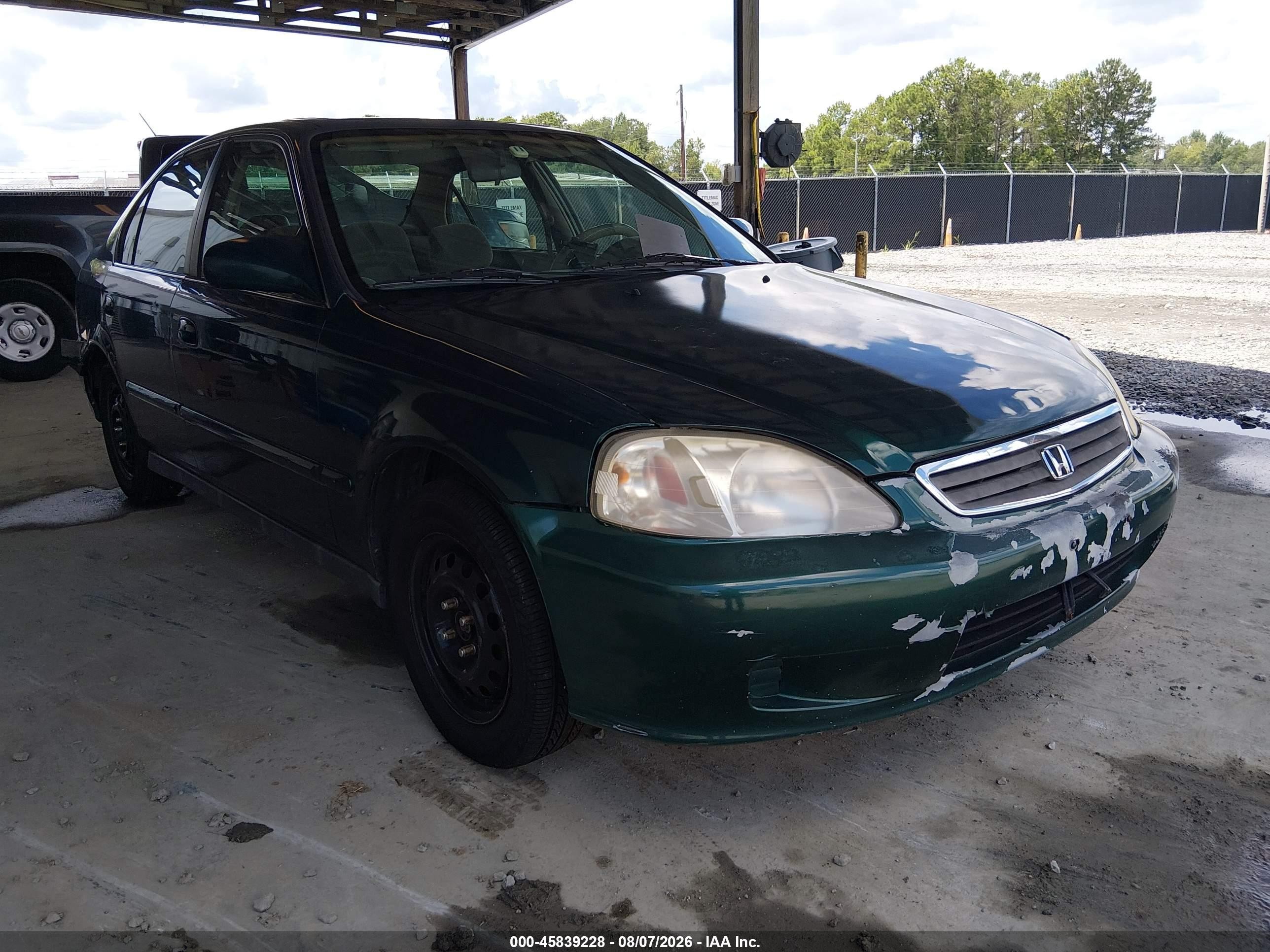 1999 Honda Civic EX, VIN 1HGEJ8640XL029617 — Normal wear