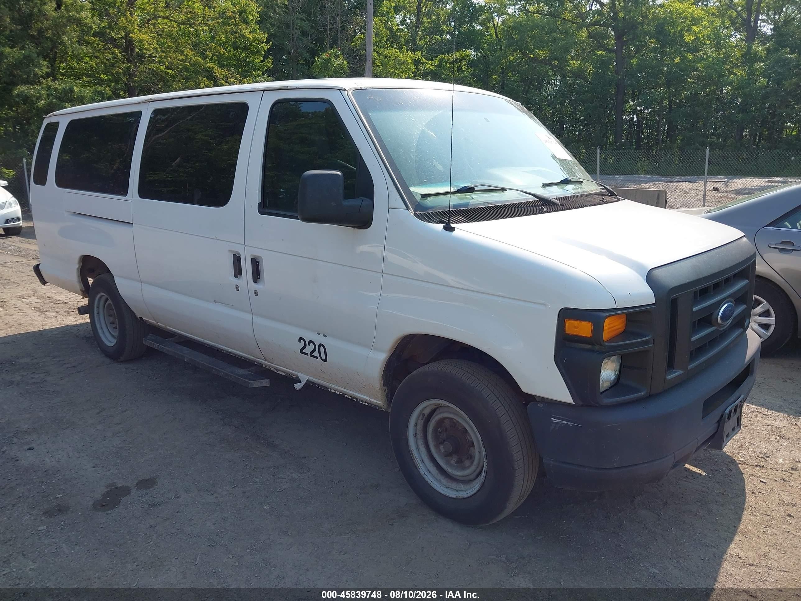 2011 Ford Econoline Passenger XLT, VIN 1FBSS3BL8BDA60815 — Rear end