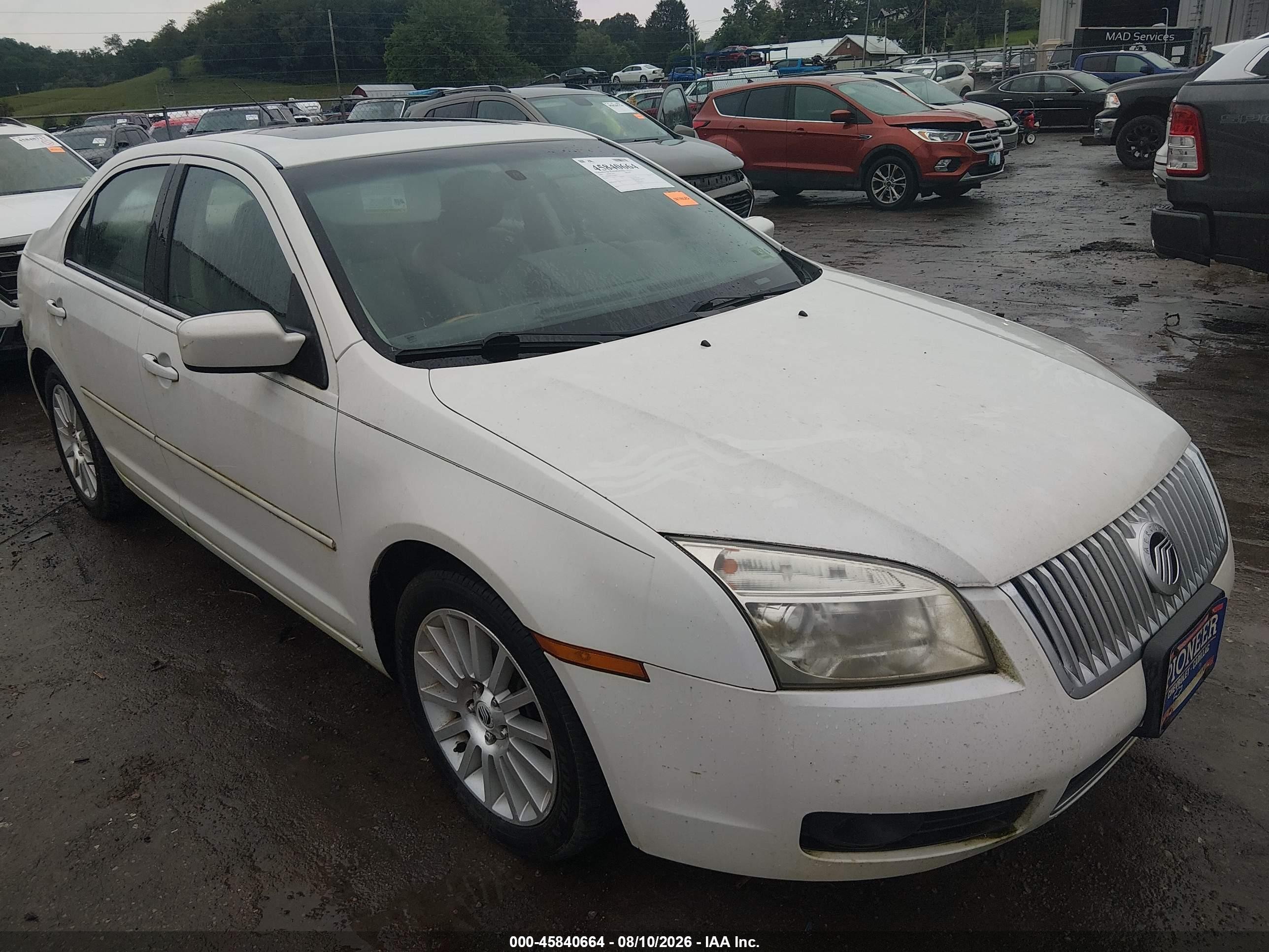 2009 Mercury Milan Premier, VIN 3MEHM08139R600673 — Обычный износ