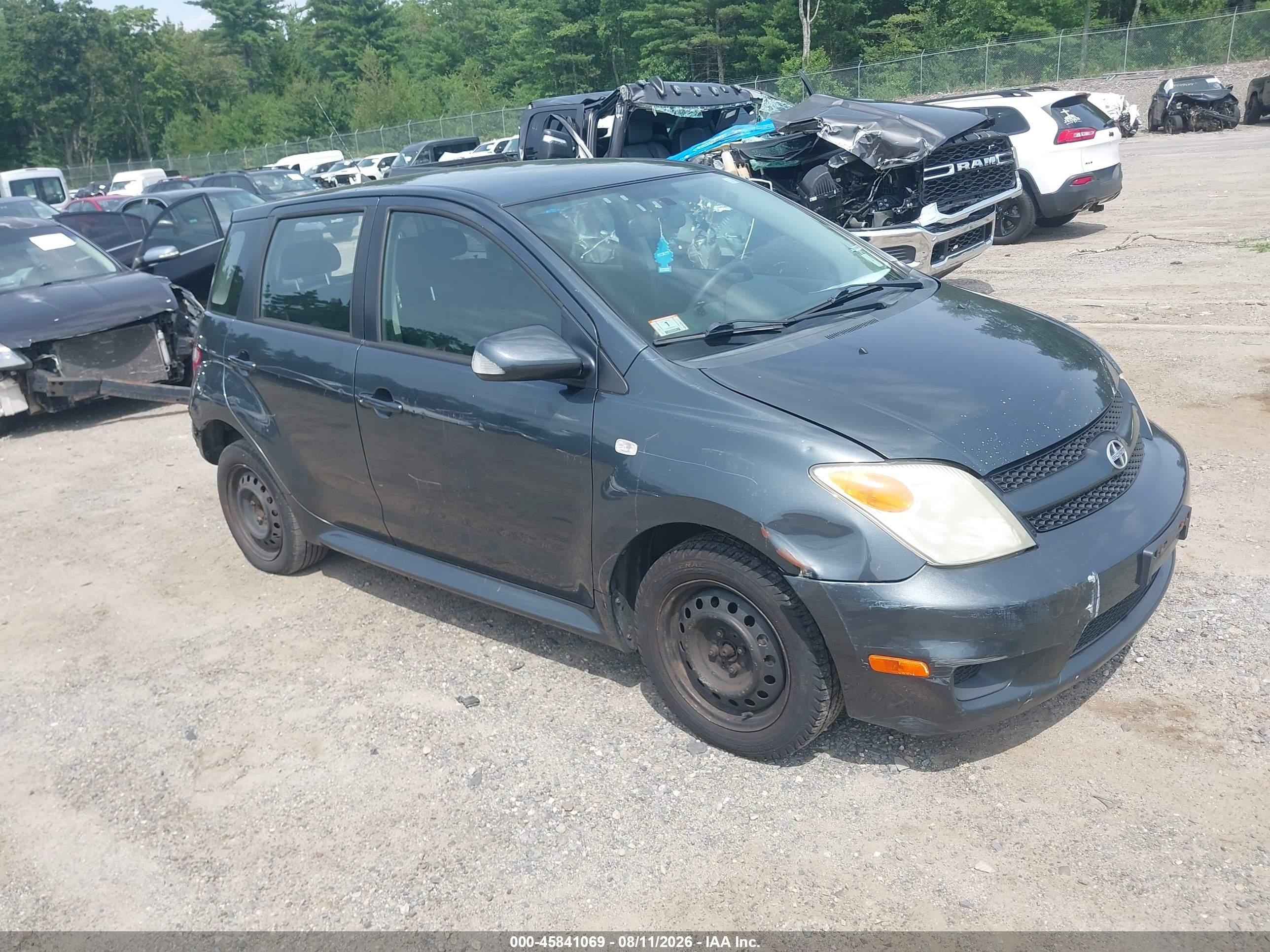 2006 Scion xA, VIN JTKKT624860164083 — Бок