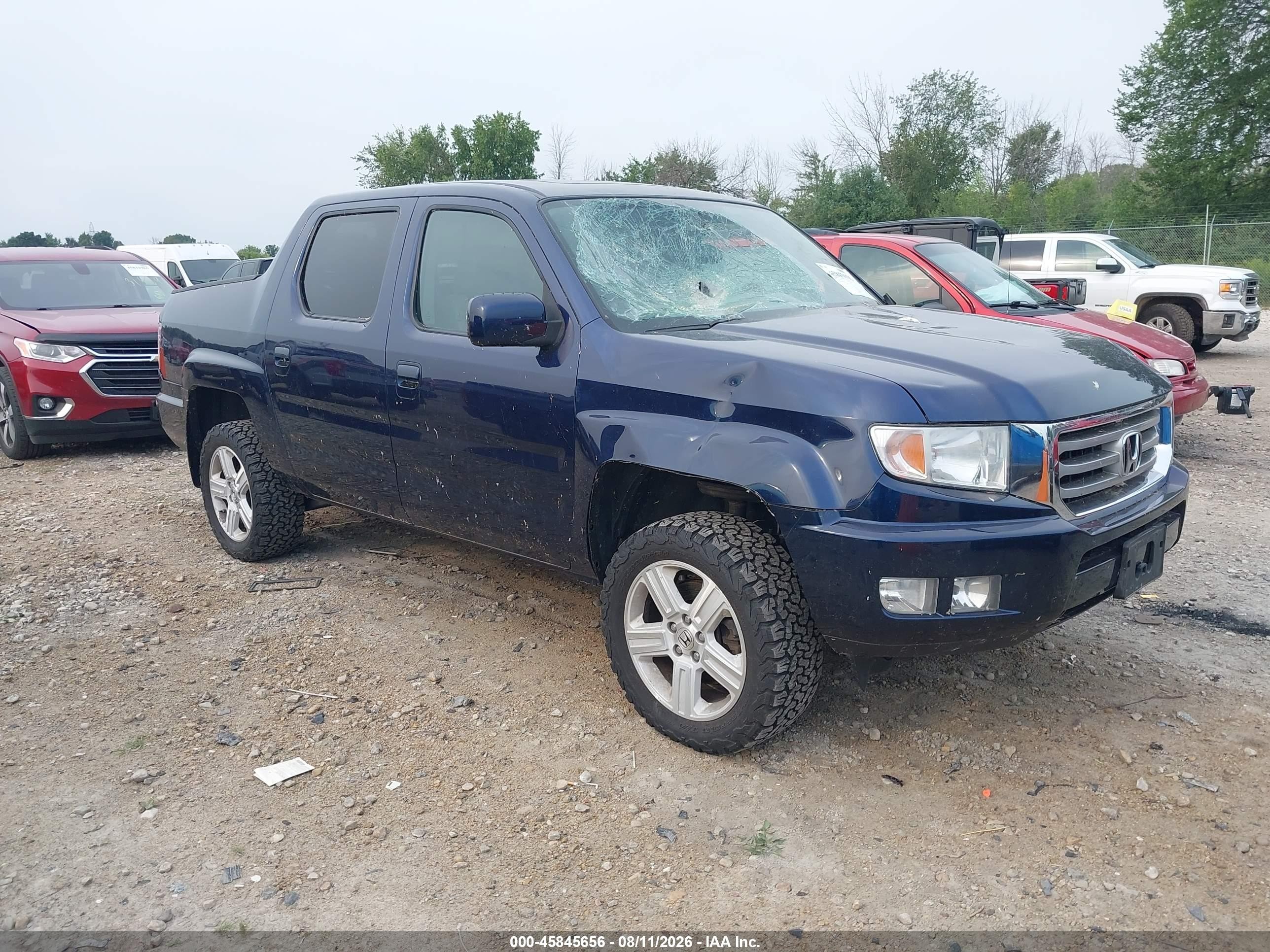2013 Honda Ridgeline RTL, VIN 5FPYK1F55DB014965 — Storm