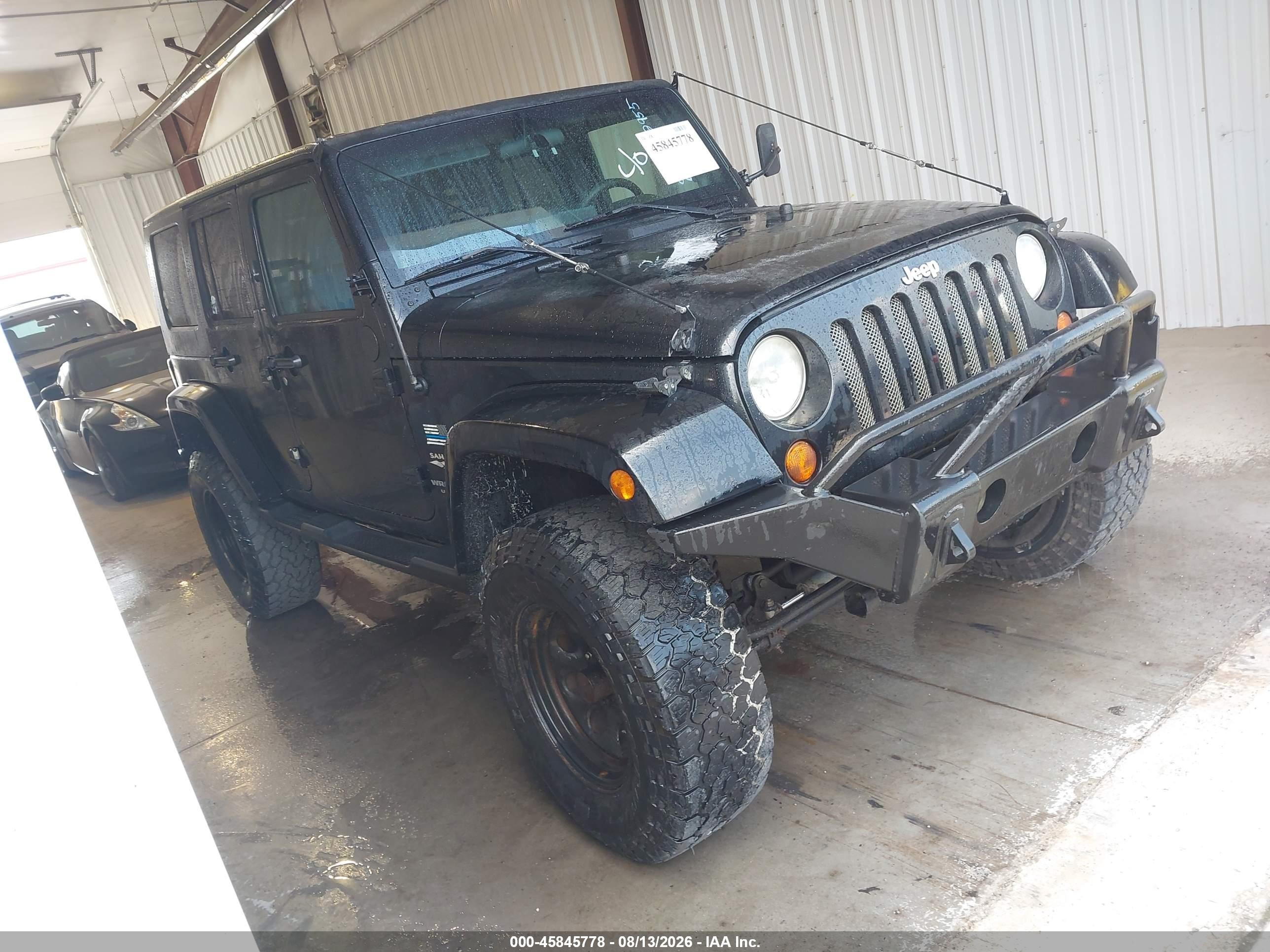 2008 Jeep Wrangler Unlimited Sahara, VIN 1J8GA59158L592955 — Normal wear