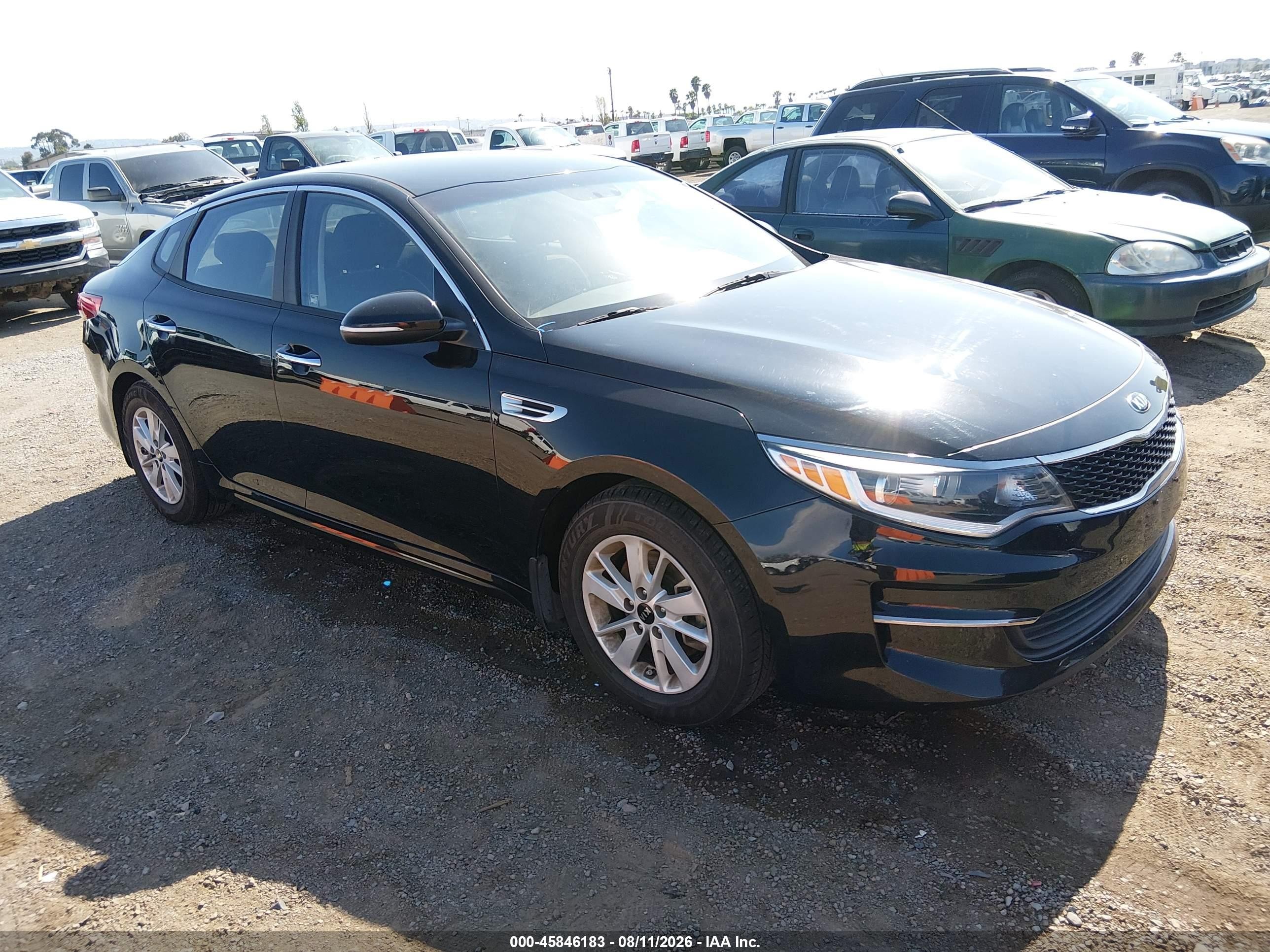 2016 Kia Optima LX, VIN 5XXGT4L30GG090746 — Normal wear