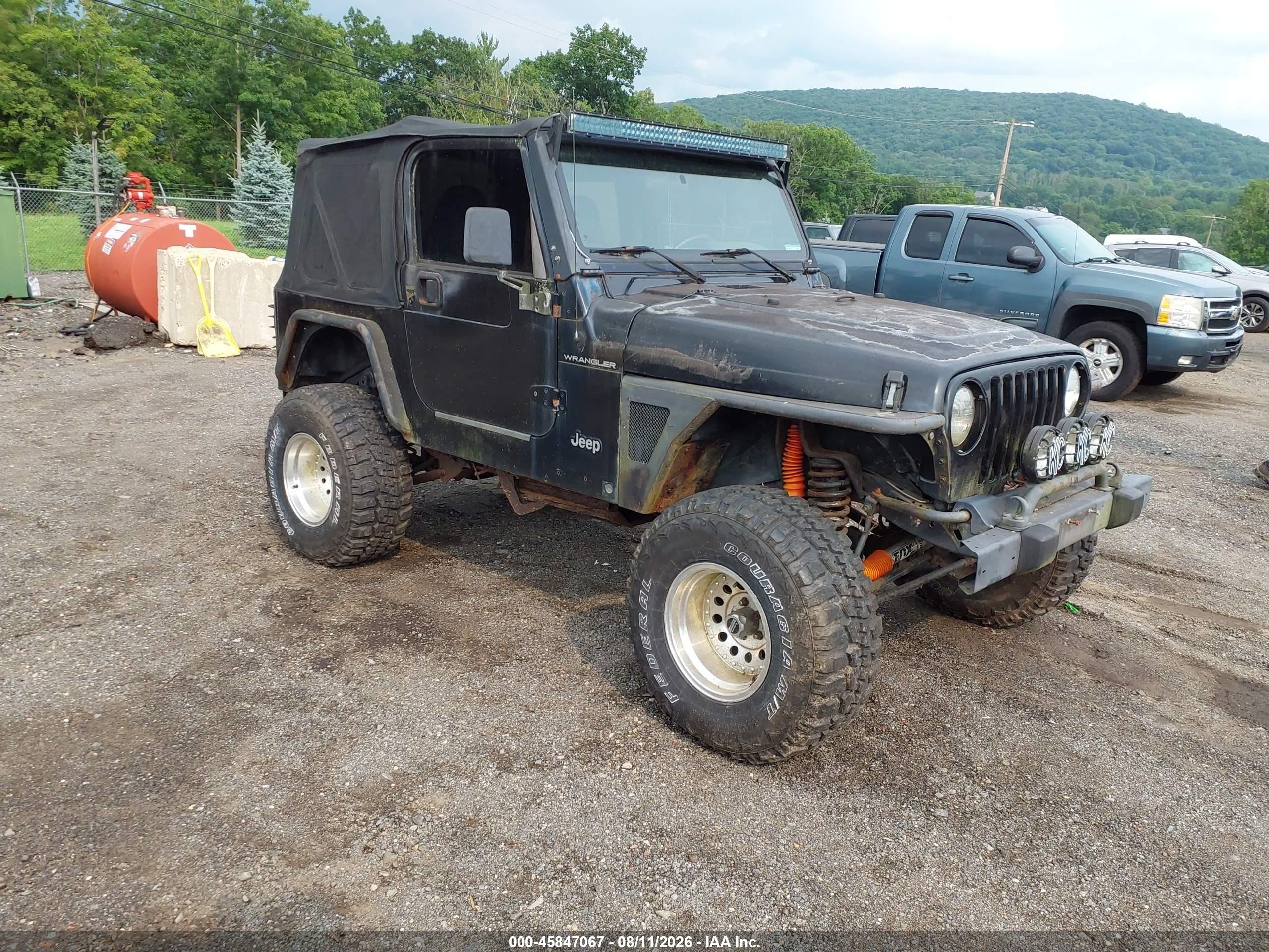 2000 Jeep Wrangler SE, VIN 1J4FA29P7YP774519 — Normal wear