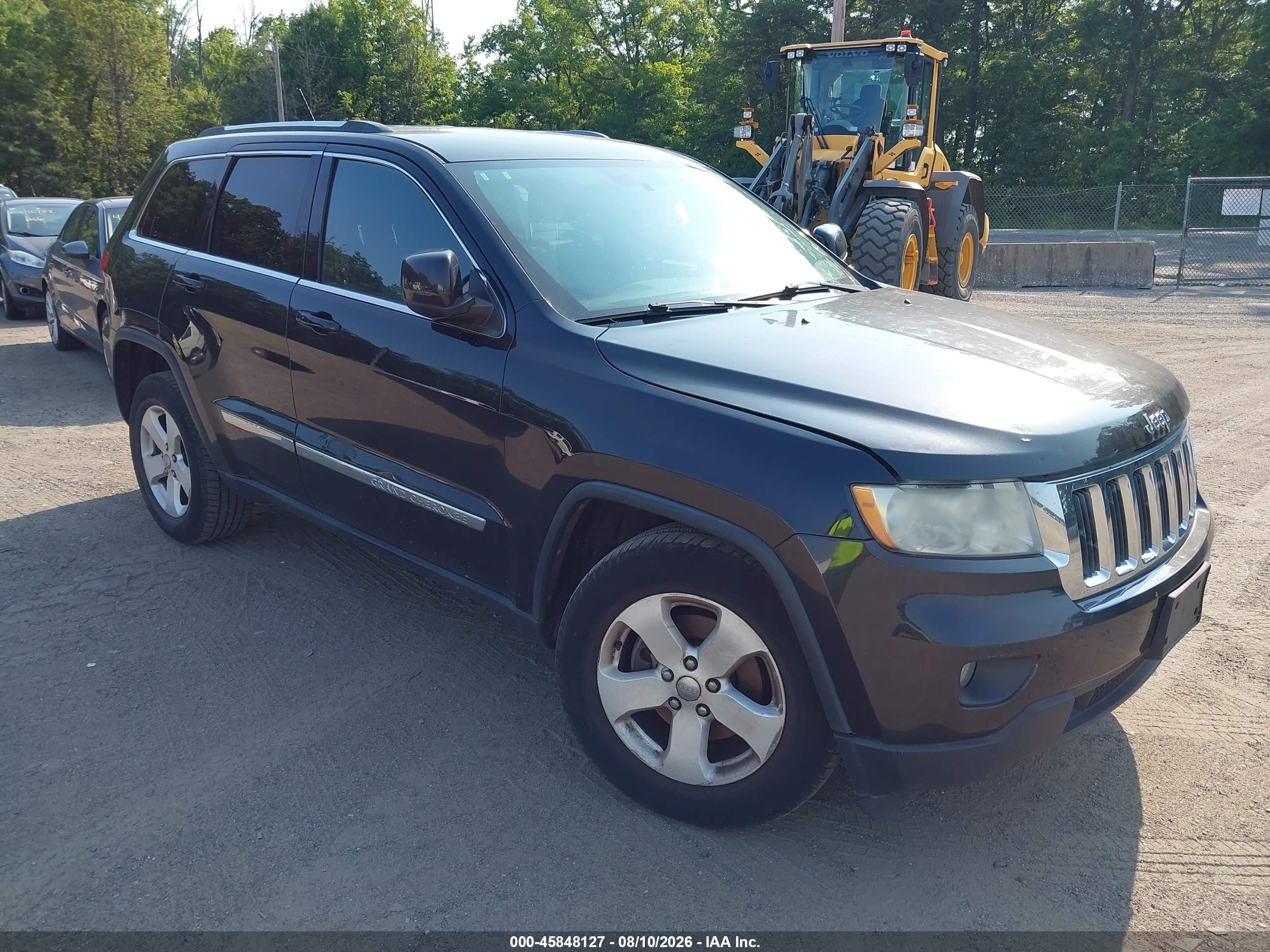 2012 Jeep Grand Cherokee Laredo Altitude, VIN 1C4RJFAT1CC301072 — Normal wear