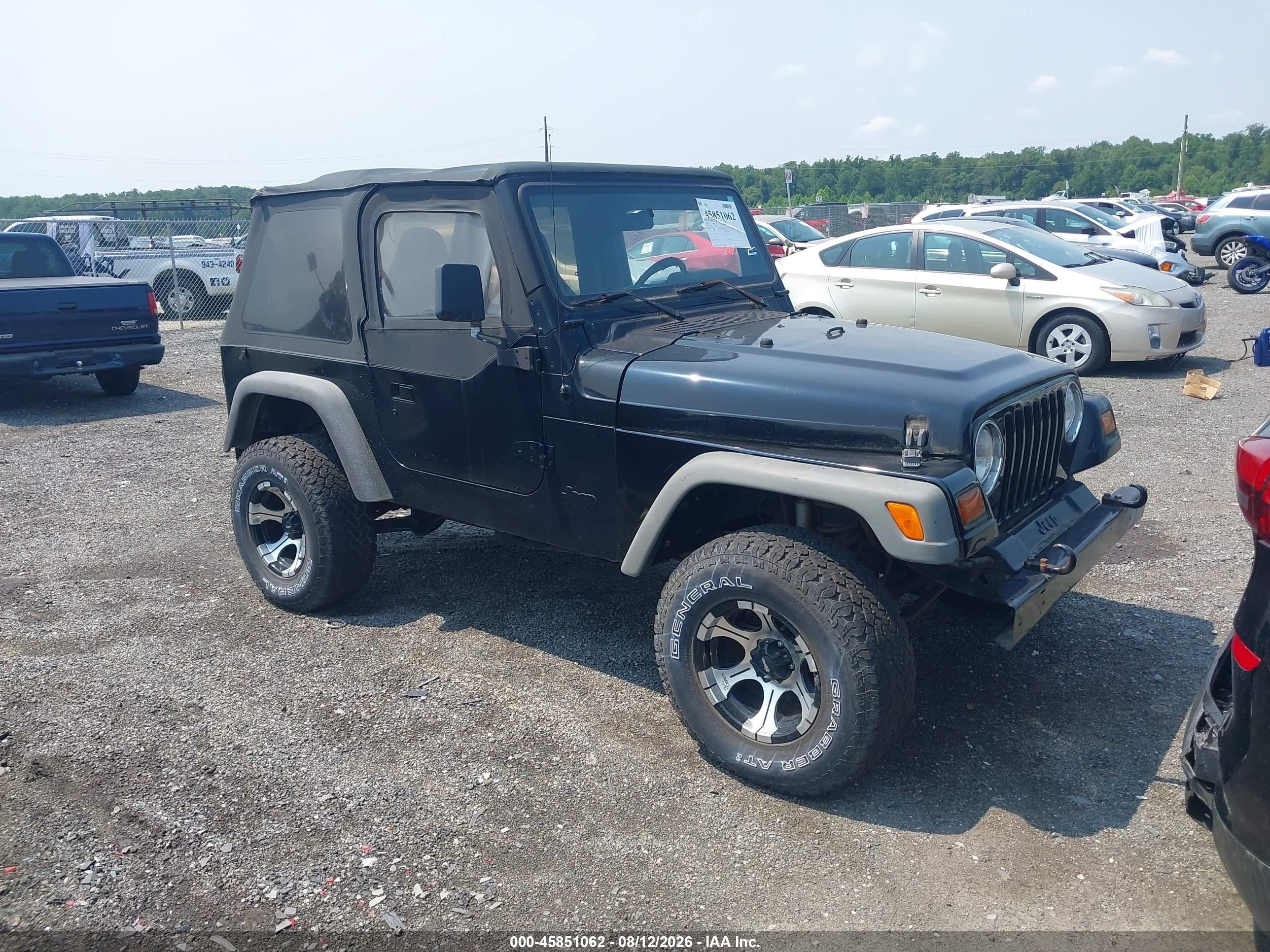 1997 Jeep Wrangler Sport, VIN 1J4FY19S5VP488979 — Normal wear