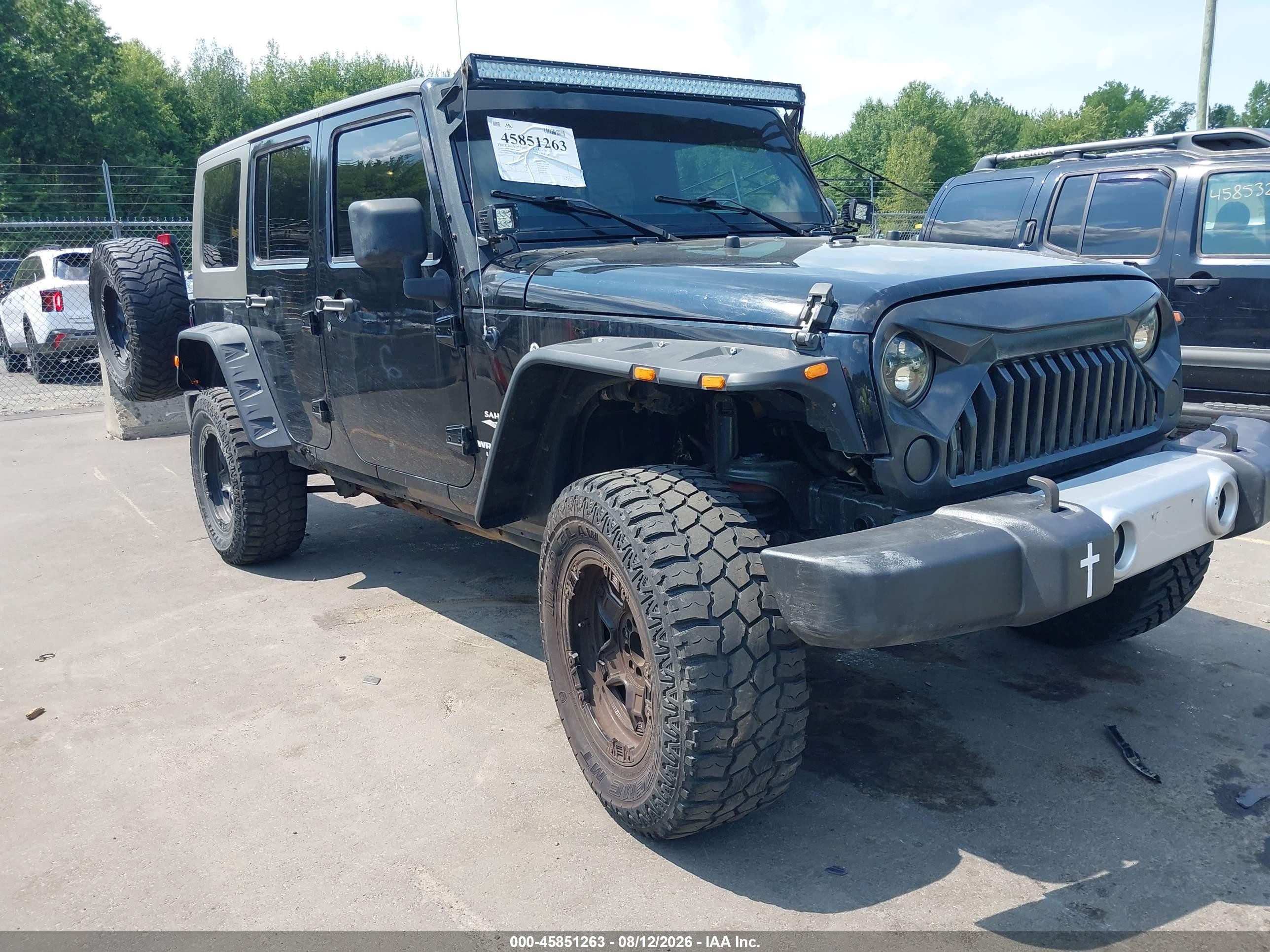 2008 Jeep Wrangler Unlimited Sahara, VIN 1J8GA59118L601683 — Normal wear