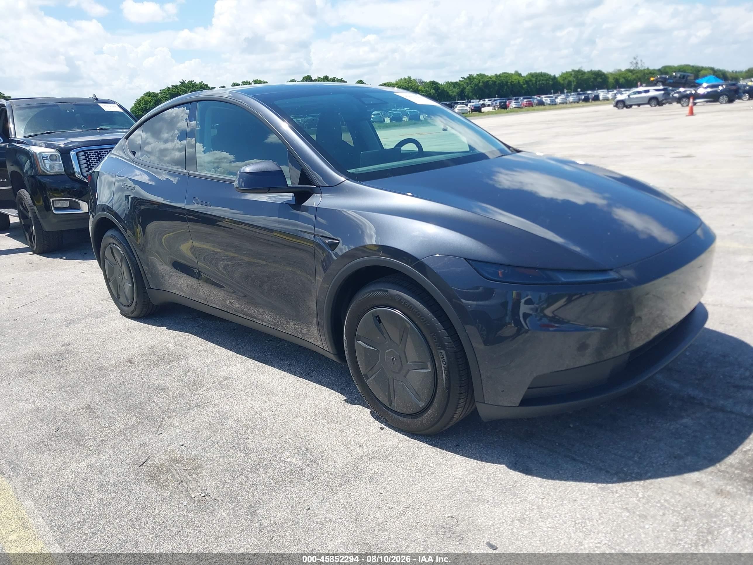 2026 Tesla Model Y Long Range Launch Series, VIN 7SAYGDEE6TA637300 — Normal wear