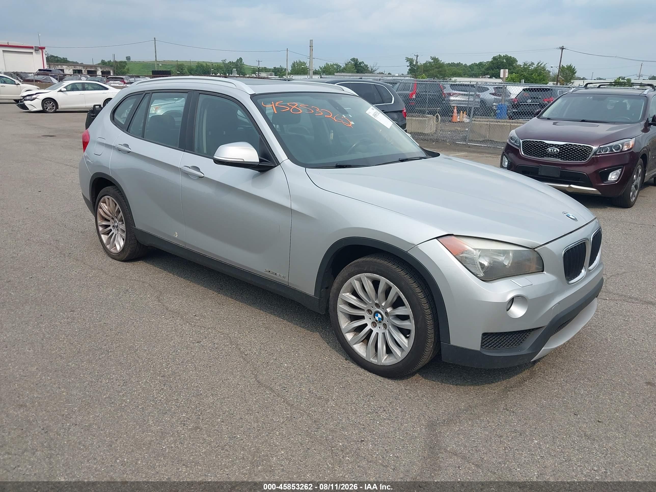 2014 BMW X1 xDrive28i, VIN WBAVL1C58EVR93314 — Rear end