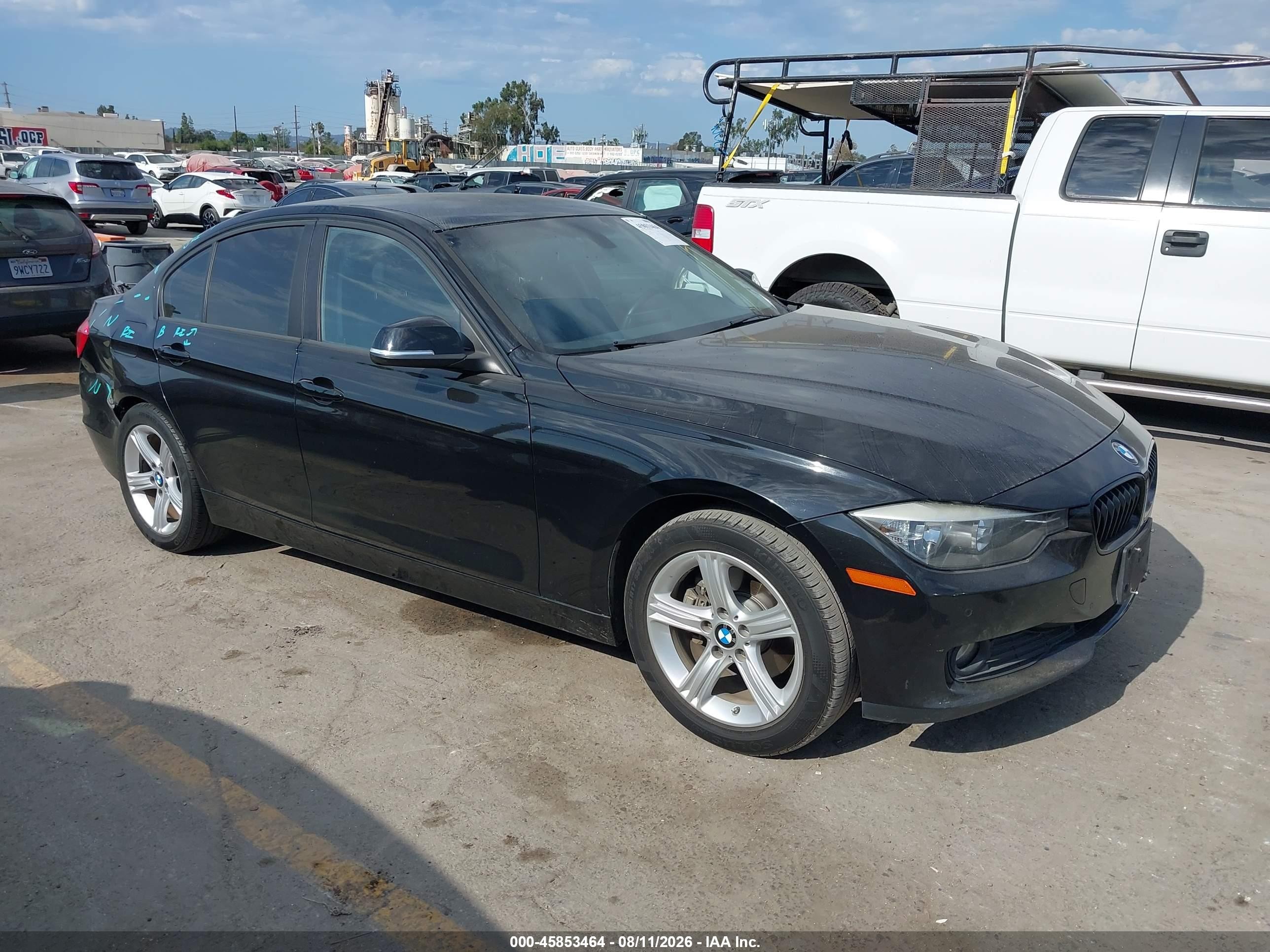 2015 BMW 3 Series 320i, VIN WBA3B1G56FNT04649 — Rear end