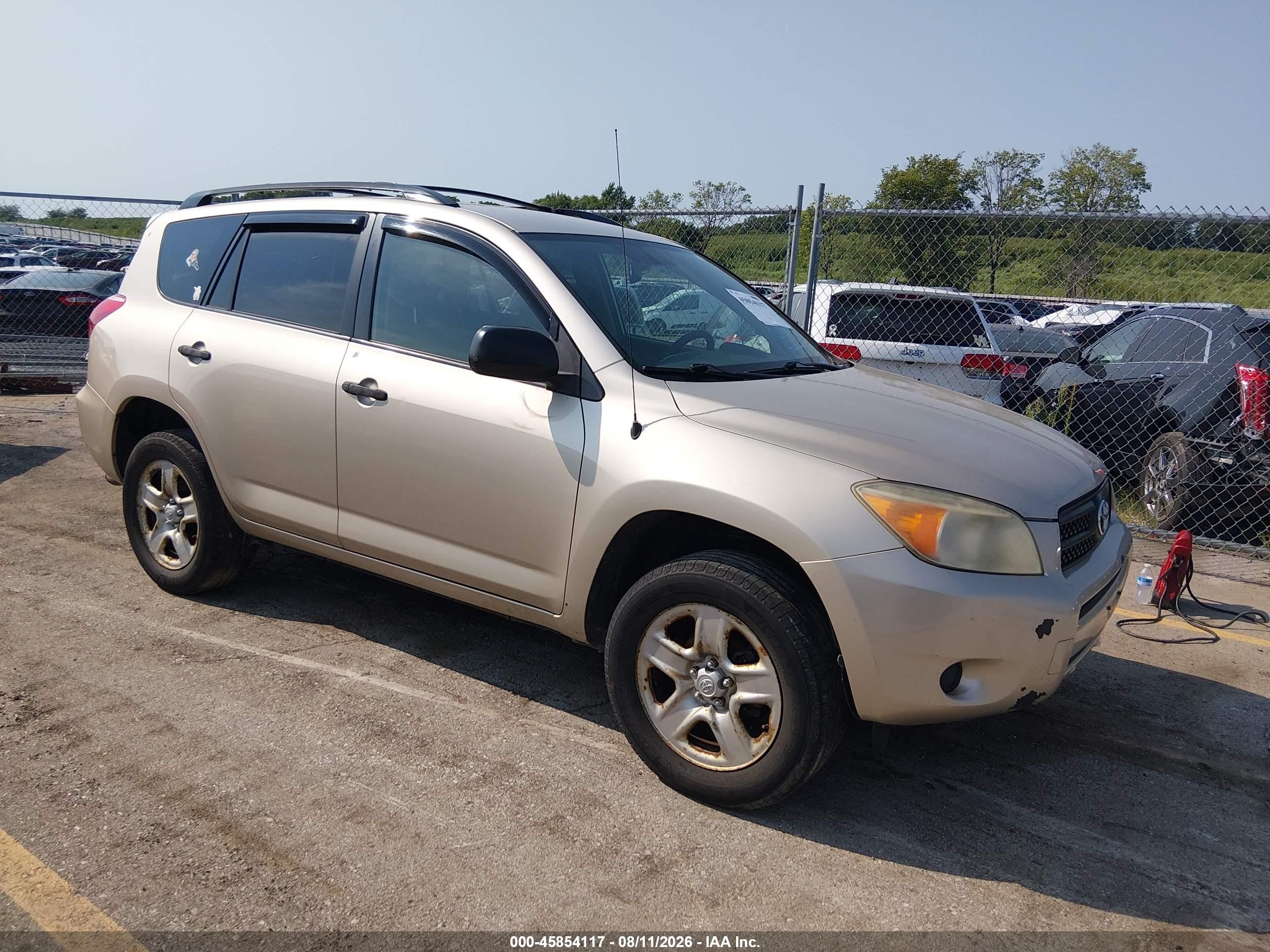 2007 Toyota RAV4, VIN JTMBD33VX75108757 — Бок