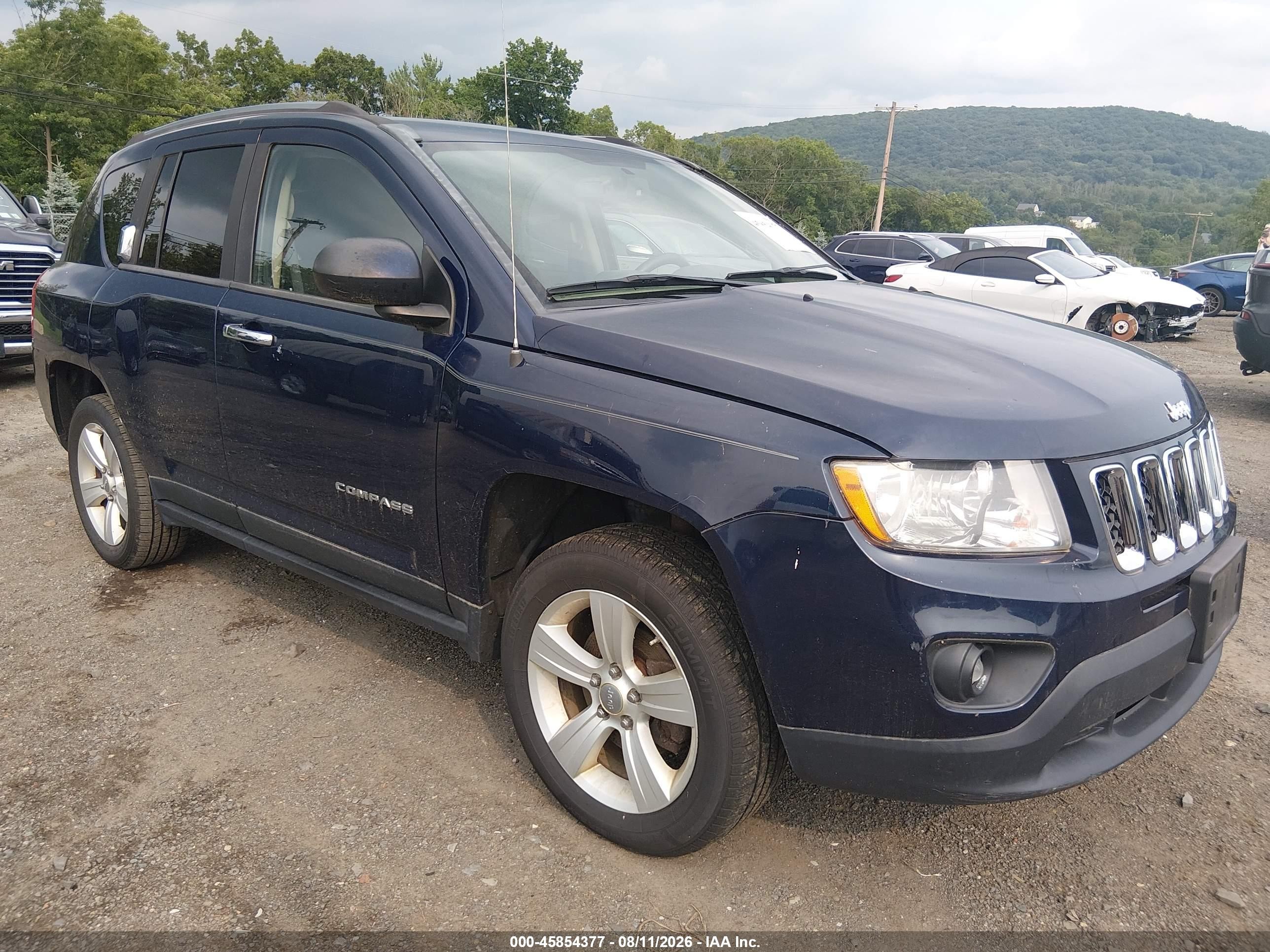 2012 Jeep Compass Sport, VIN 1C4NJDBB9CD578099 — Normal wear