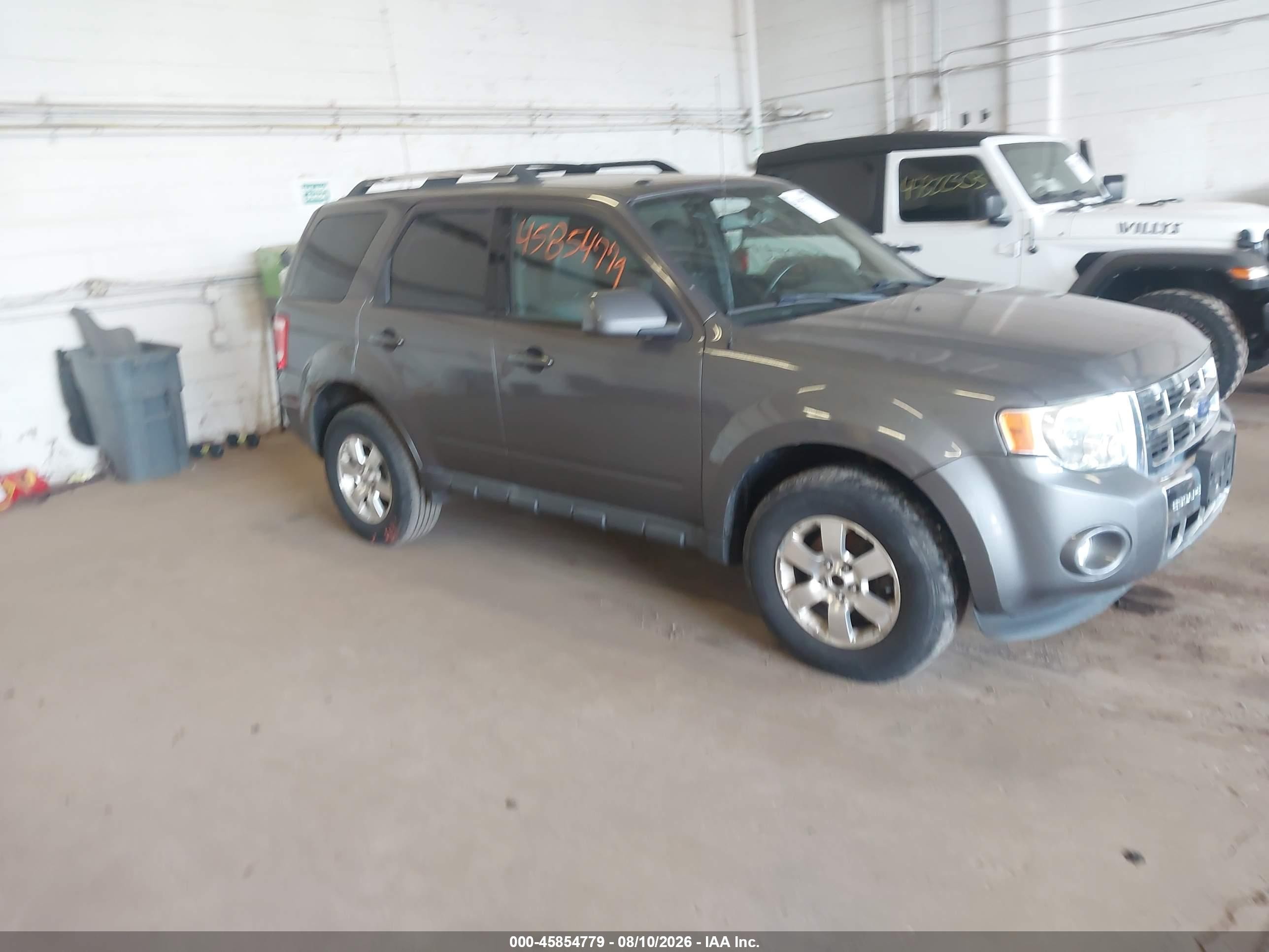 2011 Ford Escape Limited, VIN 1FMCU9EG4BKC49173 — Обычный износ