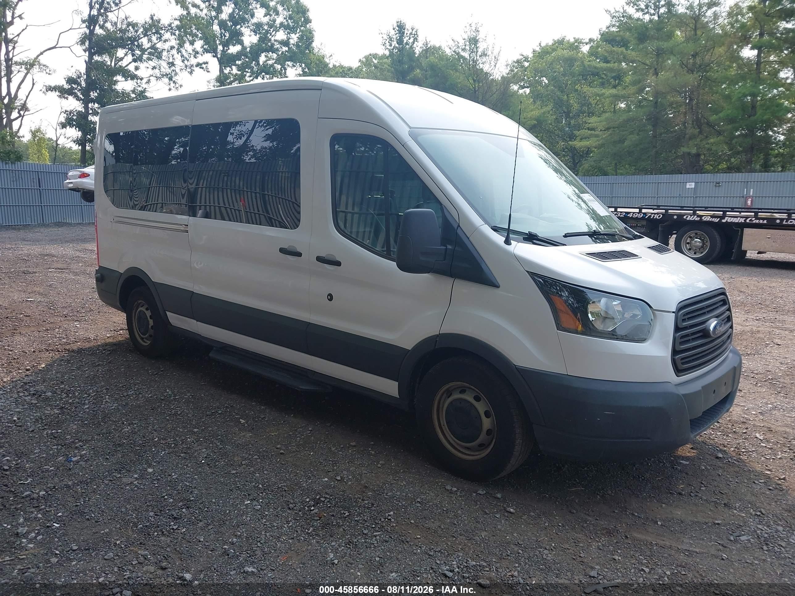 2015 Ford Transit XL, VIN 1FBAX2CV8FKA26057 — Side